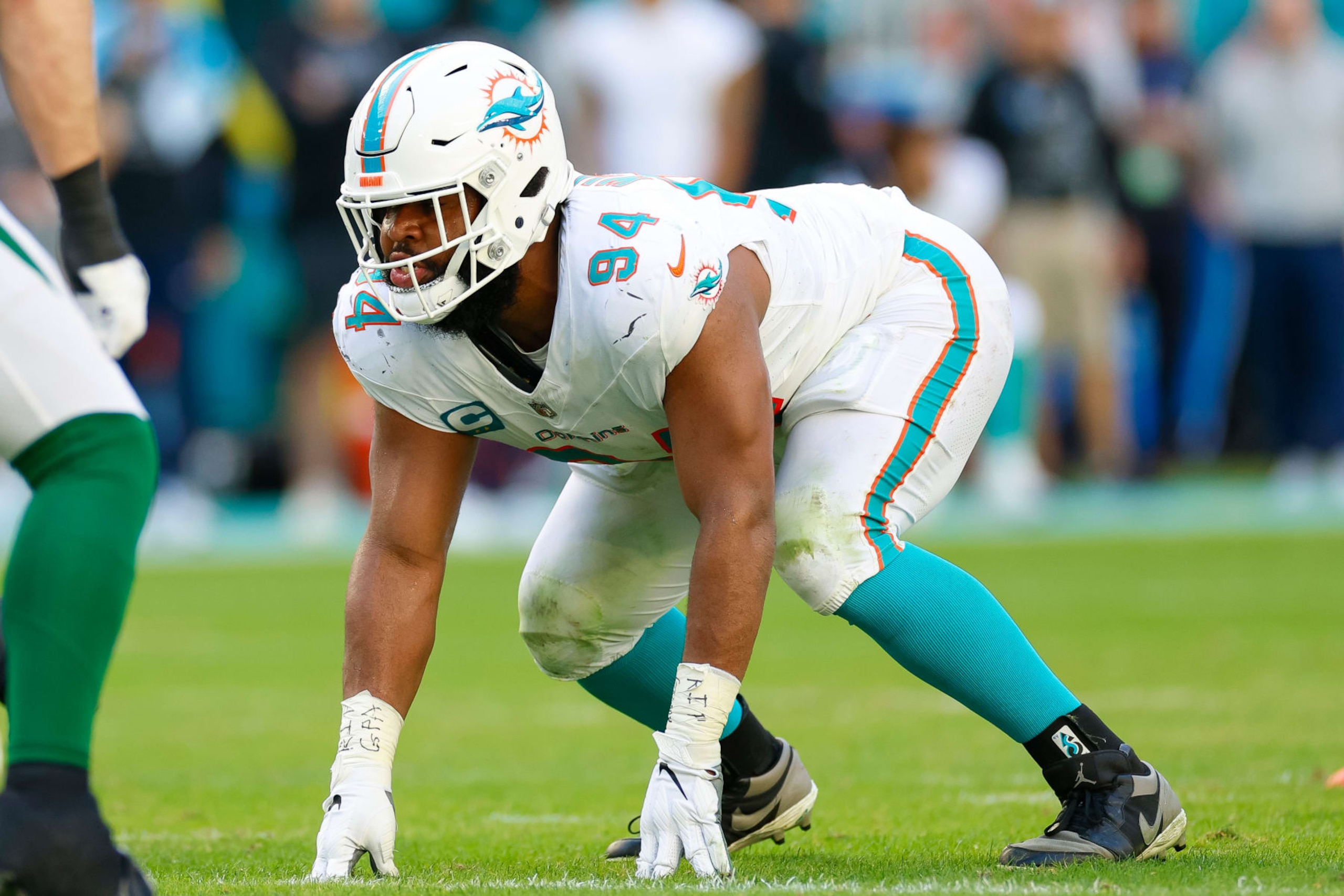 MIAMI GARDENS, FLORIDA - DECEMBER 17: Christian Wilkins #94 of the Miami Dolphins in a defensive stance during a game against the New York Jets at Hard Rock Stadium on December 17, 2023 in Miami Gardens, Florida. (Photo by Brandon Sloter/Image Of Sport/Getty Images)