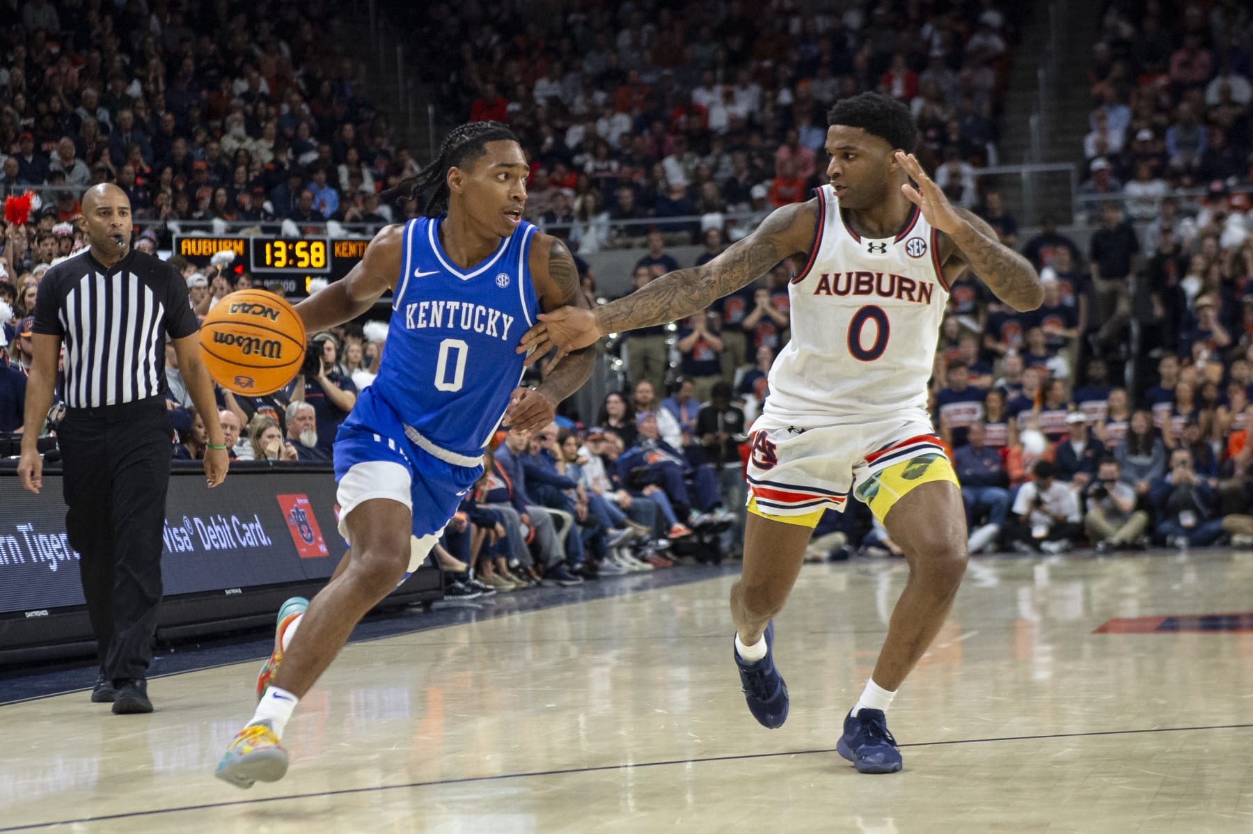 Kentucky's Rob Dillingham and Auburn's K.D. Johnson