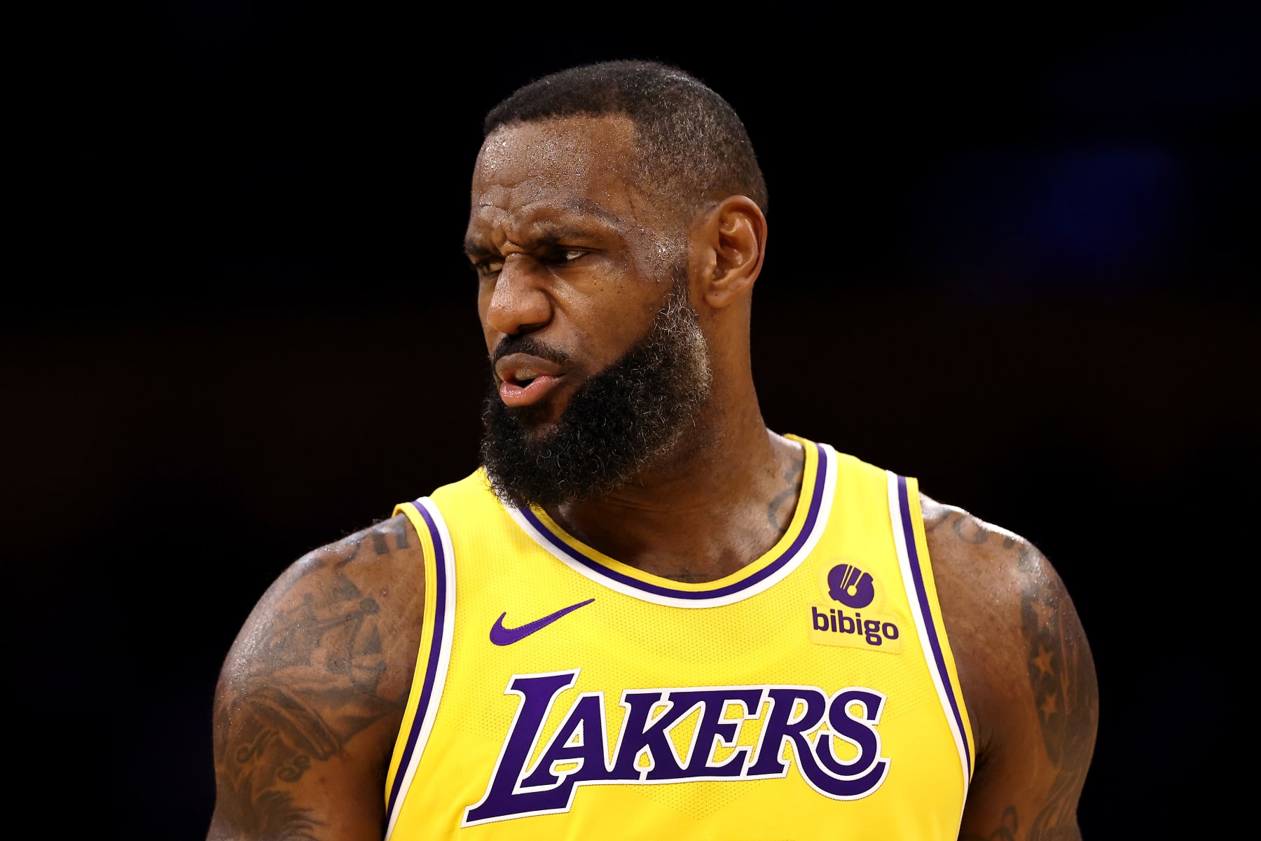 LOS ANGELES, CALIFORNIA - FEBRUARY 13: LeBron James #23 of the Los Angeles Lakers reacts to a play during the second quarter against the Detroit Pistons at Crypto.com Arena on February 13, 2024 in Los Angeles, California. NOTE TO USER: User expressly acknowledges and agrees that, by downloading and or using this photograph, user is consenting to the terms and conditions of the Getty Images License Agreement.  (Photo by Katelyn Mulcahy/Getty Images)