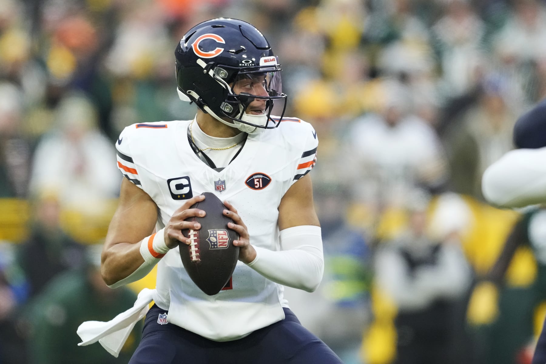 GREEN BAY, WISCONSIN - JANUARY 07: Justin Fields #1 of the Chicago Bears looks to throw a pass in the first half against the Green Bay Packers at Lambeau Field on January 07, 2024 in Green Bay, Wisconsin. (Photo by Patrick McDermott/Getty Images)