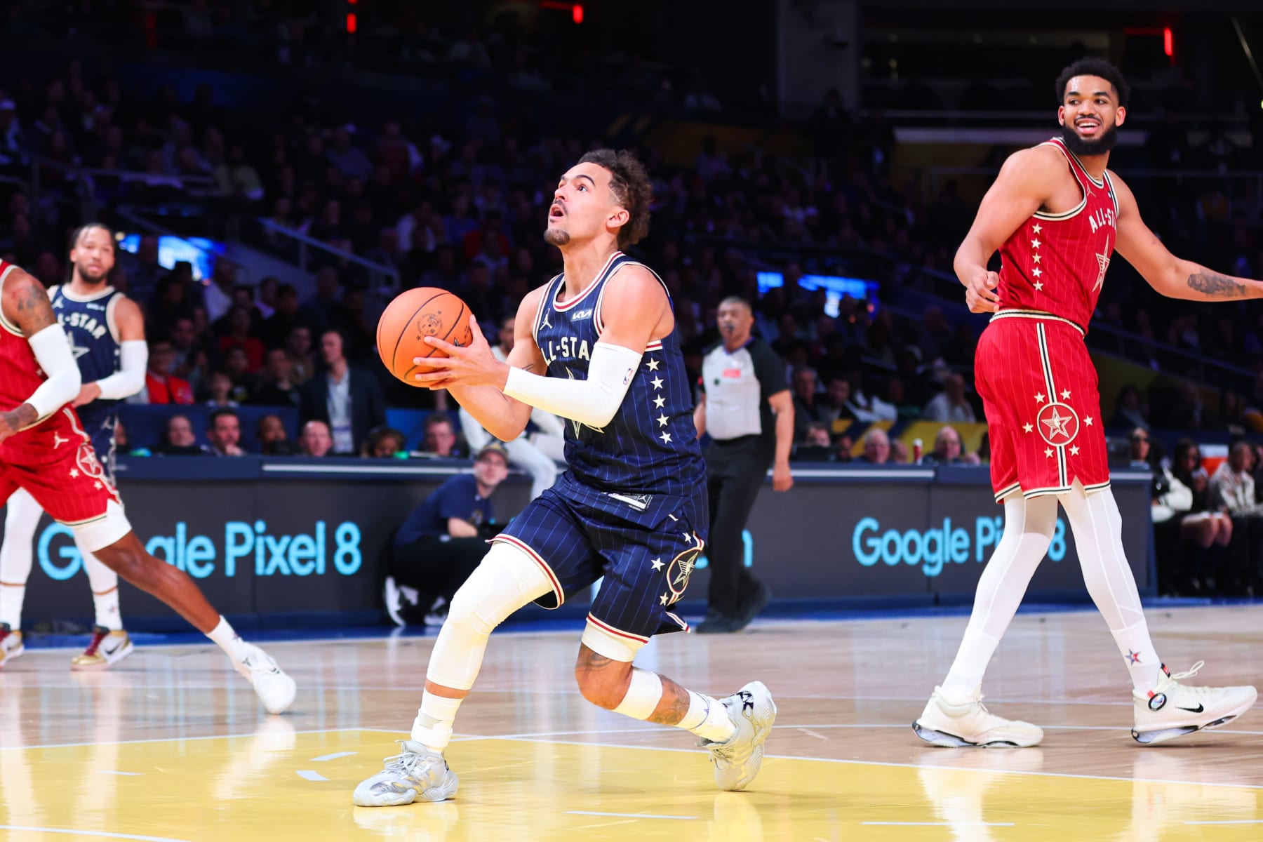 INDIANAPOLIS, INDIANA - FEBRUARY 18: Trae Young #11 of the Atlanta Hawks and Eastern Conference All-Stars drives to the basket against the Western Conference All-Stars in the second quarter during the 2024 NBA All-Star Game at Gainbridge Fieldhouse on February 18, 2024 in Indianapolis, Indiana. NOTE TO USER: User expressly acknowledges and agrees that, by downloading and or using this photograph, User is consenting to the terms and conditions of the Getty Images License Agreement. (Photo by Stacy Revere/Getty Images)