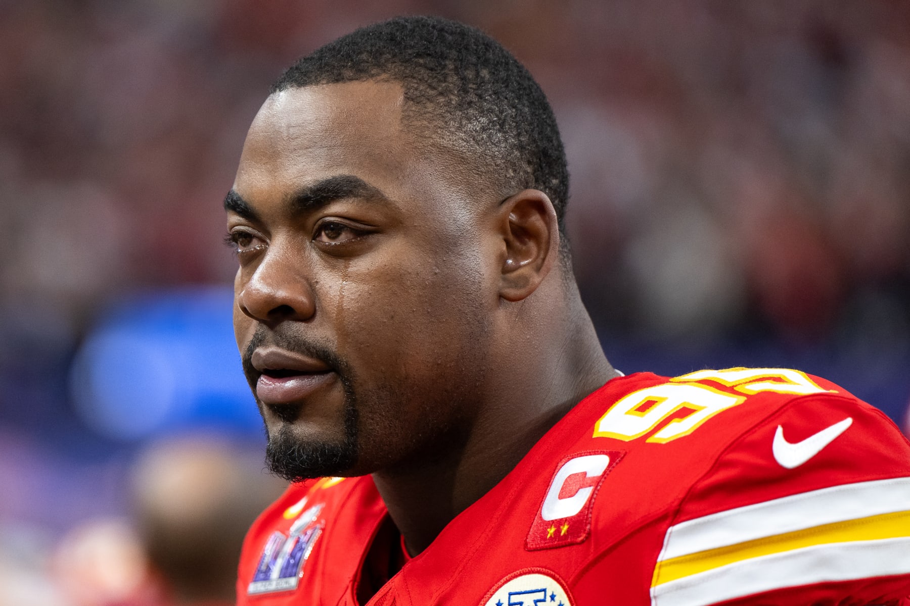 LAS VEGAS, NEVADA - FEBRUARY 11: Defensive tackle Chris Jones #95 of the Kansas City Chiefs tears up prior to Super Bowl LVIII against the San Fransisco 49ers at Allegiant Stadium on February 11, 2024 in Las Vegas, Nevada. (Photo by Luke Hales/Getty Images)