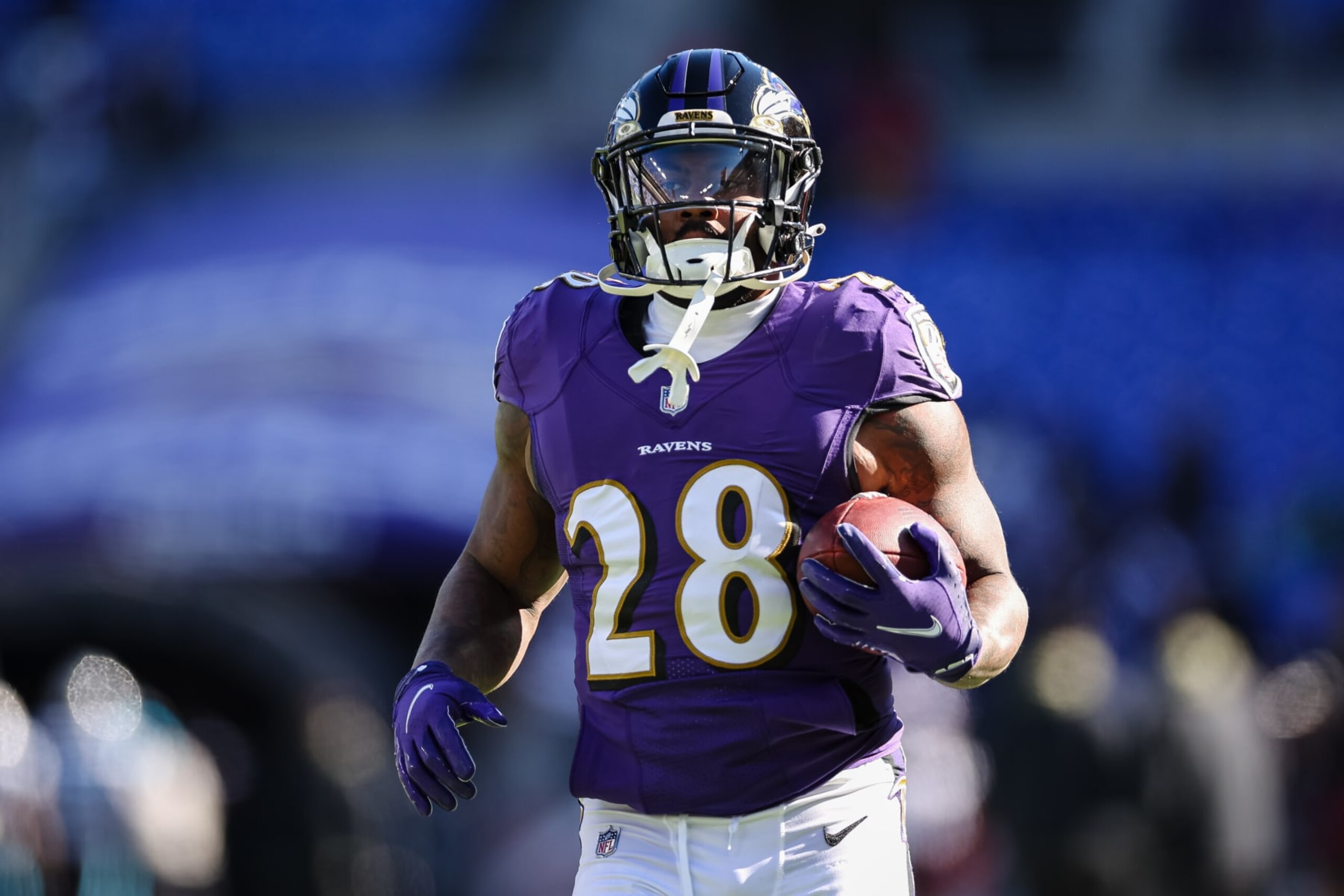 BALTIMORE, MD - NOVEMBER 20: Mike Davis #28 of the Baltimore Ravens carries the ball before the game against the Carolina Panthers at M&T Bank Stadium on November 20, 2022 in Baltimore, Maryland. (Photo by Scott Taetsch/Getty Images)