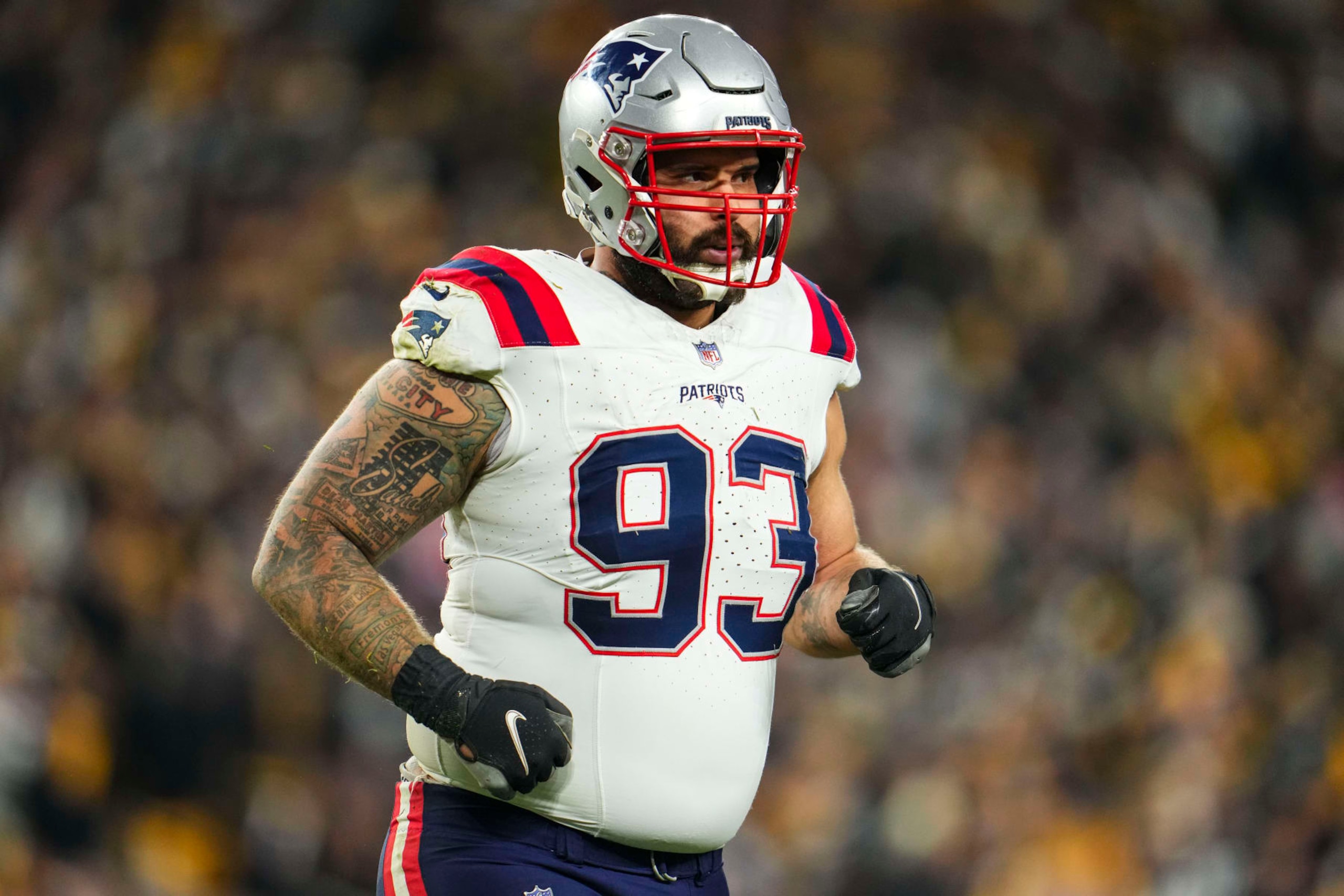 PITTSBURGH, PA - DECEMBER 07: Lawrence Guy Sr. #93 of the New England Patriots looks on from the field during an NFL football game against the Pittsburgh Steelers at Acrisure Stadium on December 7, 2023 in Pittsburgh, Pennsylvania. (Photo by Cooper Neill/Getty Images)