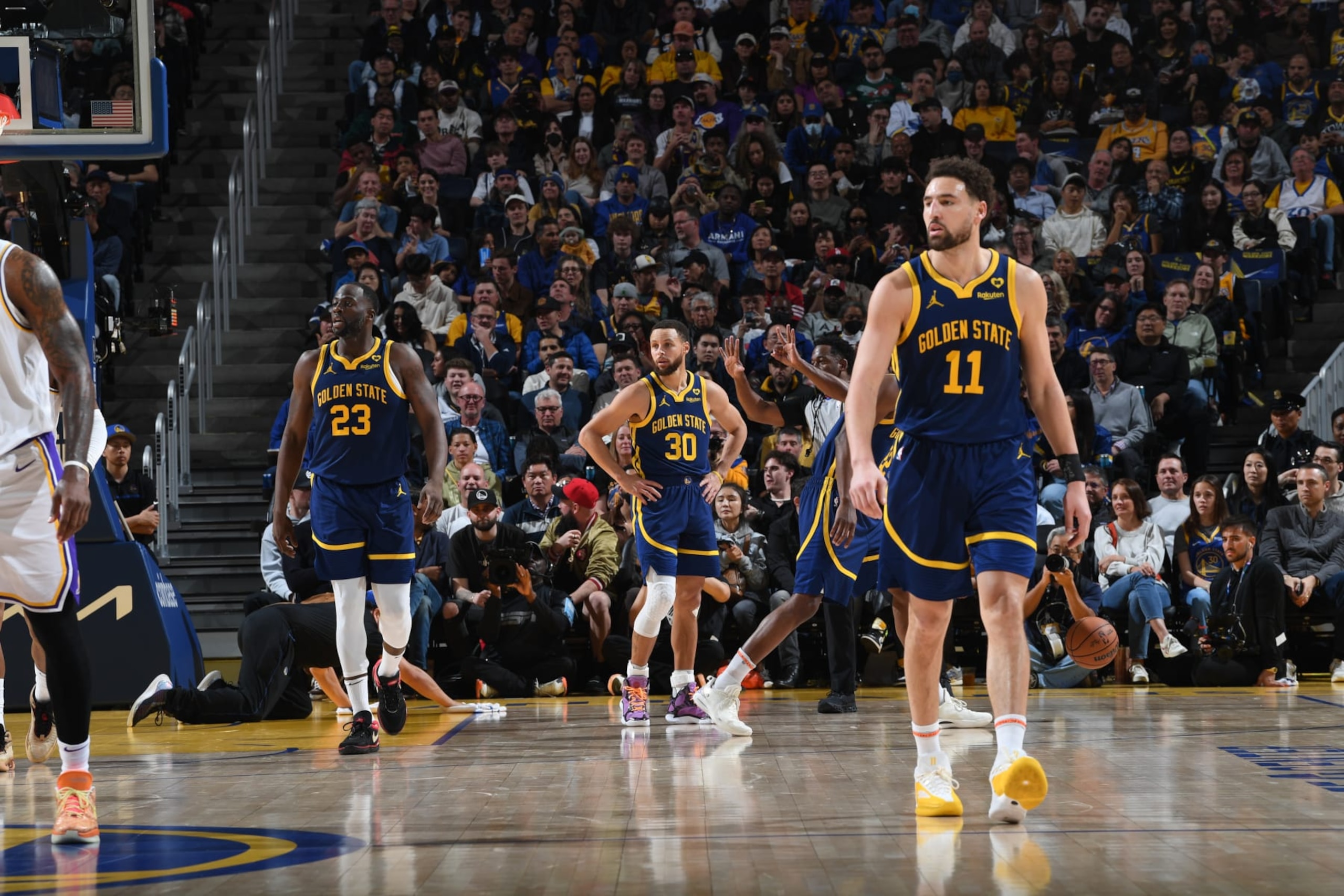 SAN FRANCISCO, CA - JANUARY 27: Draymond Green #23, Stephen Curry #30 and Klay Thompson #11 of the Golden State Warriors stand on the court during the game against the Los Angeles Lakers on January 27, 2024 at Chase Center in San Francisco, California. NOTE TO USER: User expressly acknowledges and agrees that, by downloading and or using this photograph, user is consenting to the terms and conditions of Getty Images License Agreement. Mandatory Copyright Notice: Copyright 2024 NBAE (Photo by Noah Graham/NBAE via Getty Images) SAN FRANCISCO, CA - JANUARY 27: Draymond Green #23, Stephen Curry #30 and Klay Thompson #11 of the Golden State Warriors stand on the court during the game against the Los Angeles Lakers on January 27, 2024 at Chase Center in San Francisco, California. NOTE TO USER: User expressly acknowledges and agrees that, by downloading and or using this photograph, user is consenting to the terms and conditions of Getty Images License Agreement. Mandatory Copyright Notice: Copyright 2024 NBAE (Photo by Noah Graham/NBAE via Getty Images)