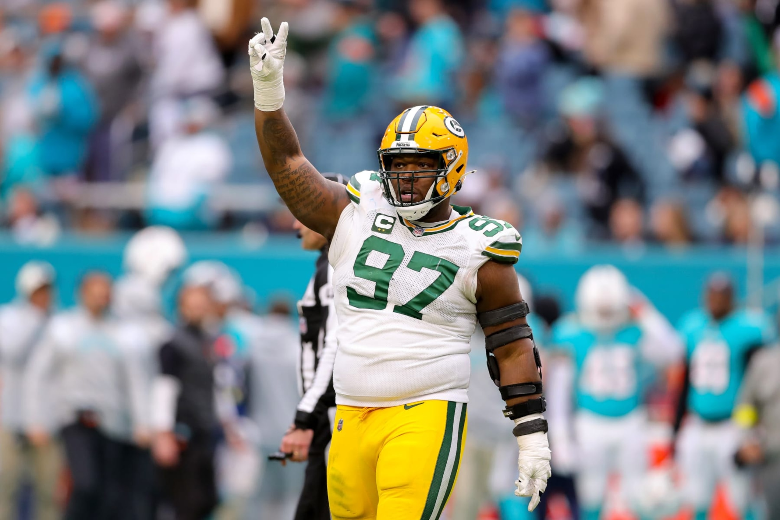 MIAMI GARDENS, FLORIDA - DECEMBER 25: Kenny Clark #97 of the Green Bay Packers reacts after defeating the Miami Dolphins at Hard Rock Stadium on December 25, 2022 in Miami Gardens, Florida. (Photo by Megan Briggs/Getty Images)