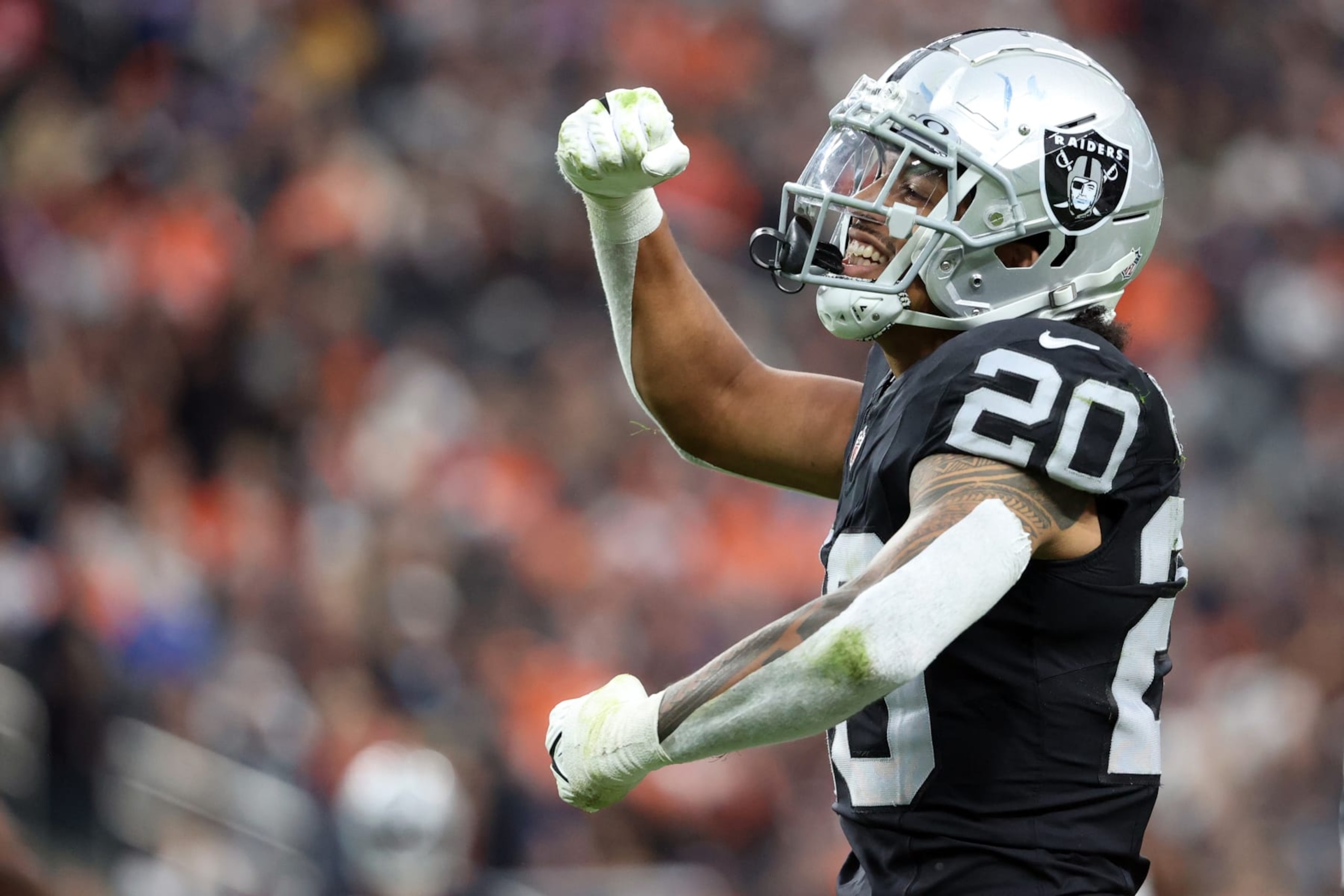 LAS VEGAS, NEVADA - JANUARY 07: Isaiah Pola-Mao #20 of the Las Vegas Raiders reacts after a sack during the second quarter in the game against the Denver Broncos at Allegiant Stadium on January 07, 2024 in Las Vegas, Nevada. (Photo by Ian Maule/Getty Images)