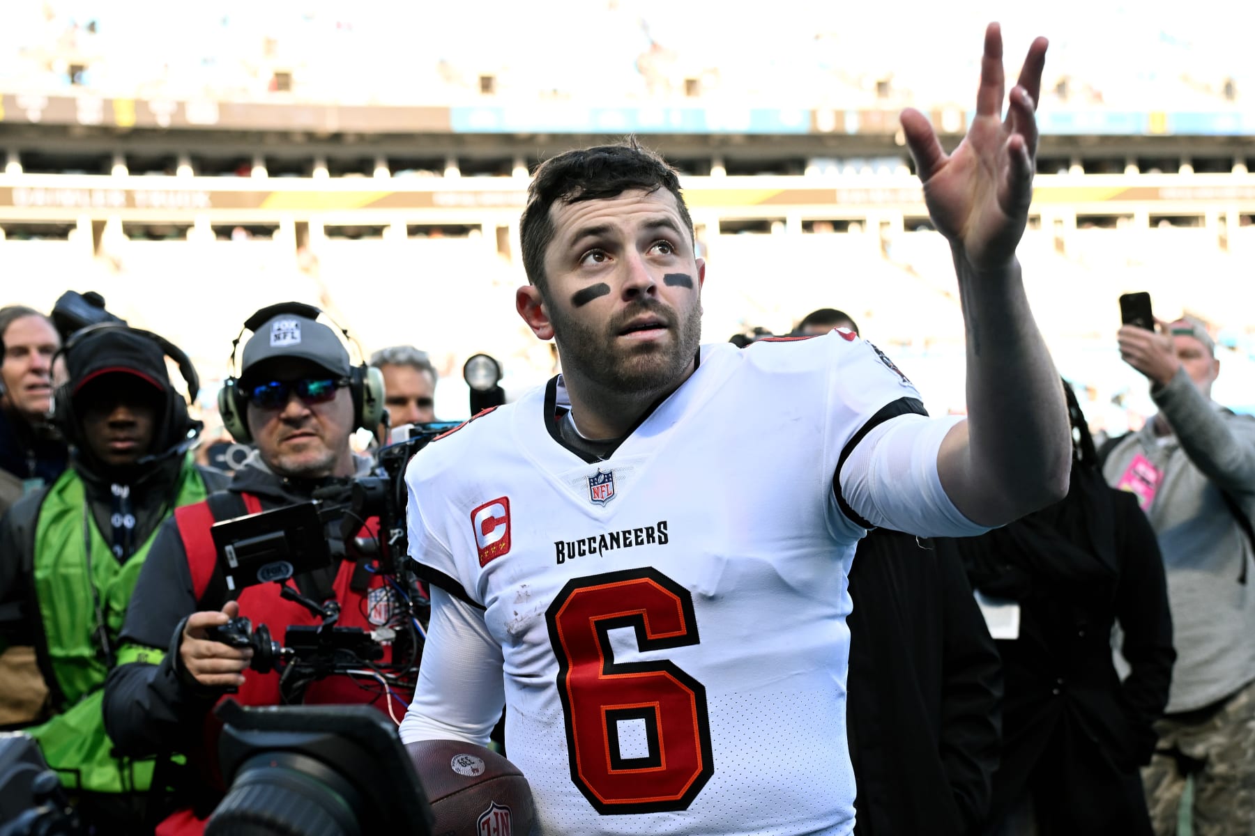 CHARLOTTE, NORTH CAROLINA - JANUARY 07: Baker Mayfield #6 of the Tampa Bay Buccaneers waves to fans after the game against the Carolina Panthers at Bank of America Stadium on January 07, 2024 in Charlotte, North Carolina. (Photo by Grant Halverson/Getty Images)