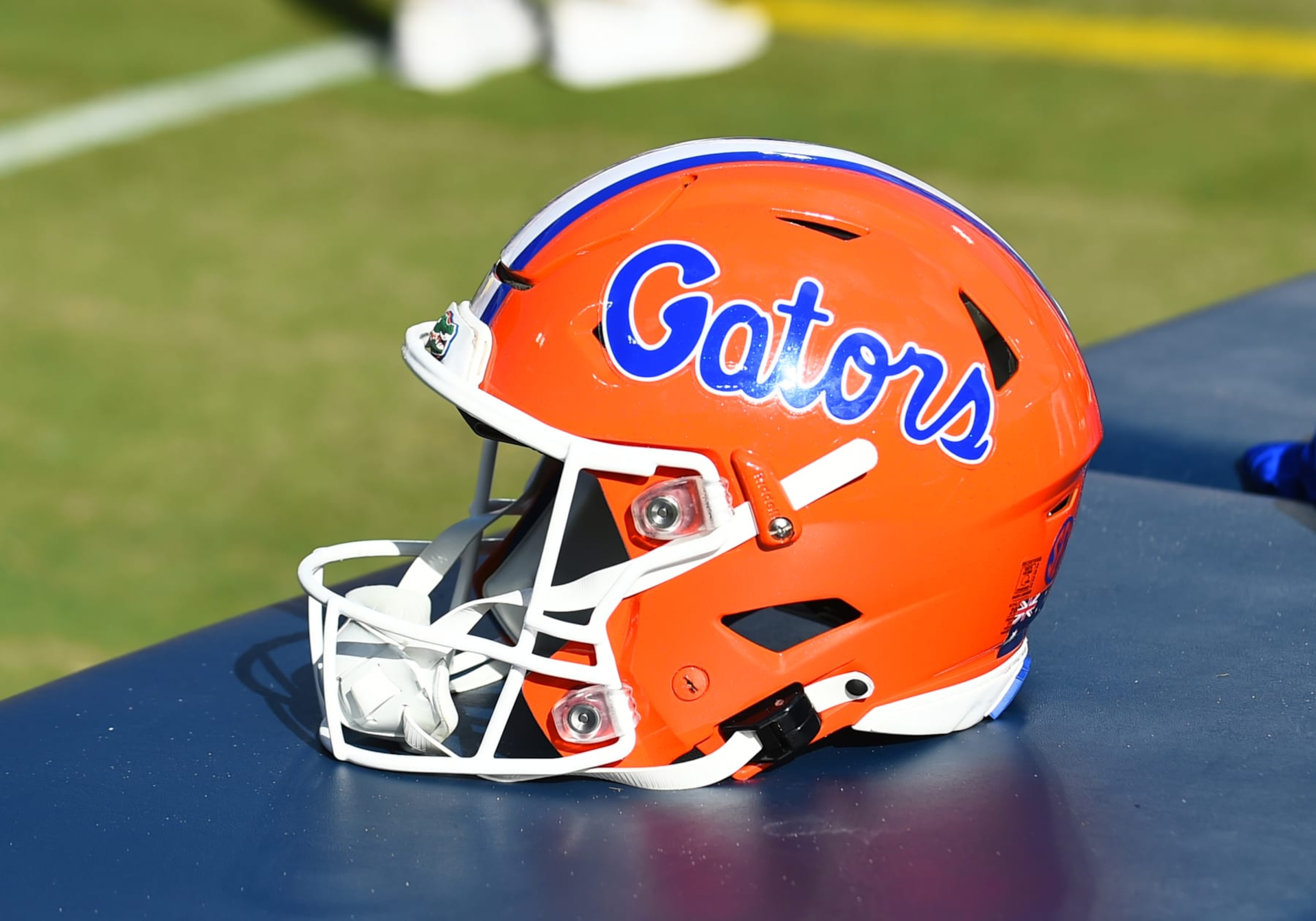 JACKSONVILLE, FL - OCTOBER 28: A Florida Gators football helmet sits on the sideline during the college football game between the Georgia Bulldogs and the Florida Gators on October 28, 2023, at EverBank Stadium in Jacksonville, FL. (Photo by Jeffrey Vest/Icon Sportswire via Getty Images) JACKSONVILLE, FL - OCTOBER 28: A Florida Gators football helmet sits on the sideline during the college football game between the Georgia Bulldogs and the Florida Gators on October 28, 2023, at EverBank Stadium in Jacksonville, FL. (Photo by Jeffrey Vest/Icon Sportswire via Getty Images)