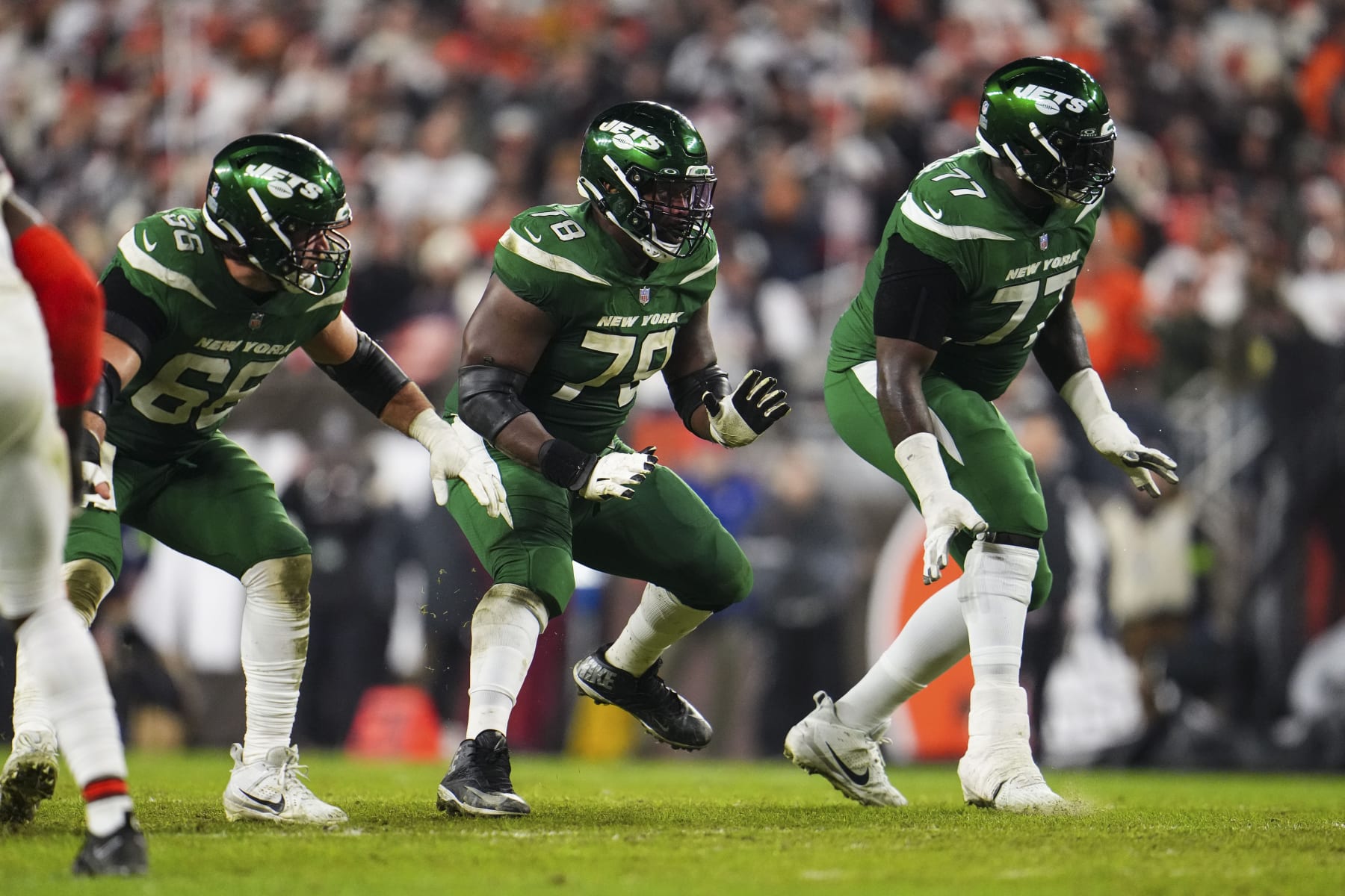 CLEVELAND, OH - DECEMBER 28: Laken Tomlinson #78 of the New York Jets drops back to block during an NFL football game against the Cleveland Browns at Cleveland Browns Stadium on December 28, 2023 in Cleveland, Ohio. (Photo by Cooper Neill/Getty Images)
