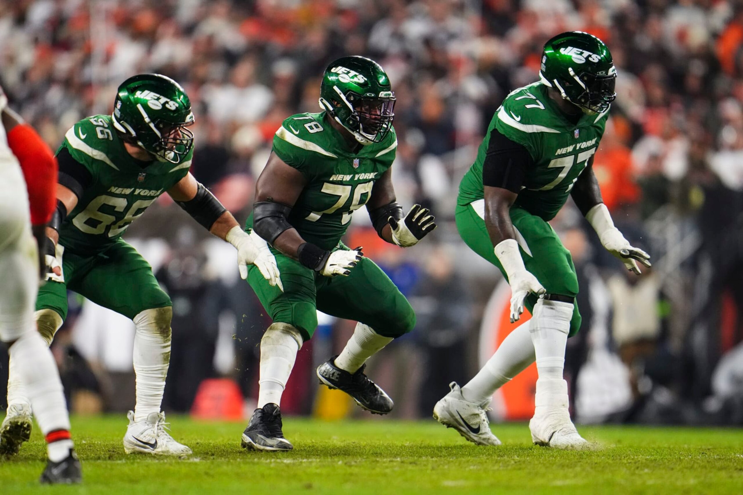 CLEVELAND, OH - DECEMBER 28: Laken Tomlinson #78 of the New York Jets drops back to block during an NFL football game against the Cleveland Browns at Cleveland Browns Stadium on December 28, 2023 in Cleveland, Ohio. (Photo by Cooper Neill/Getty Images)