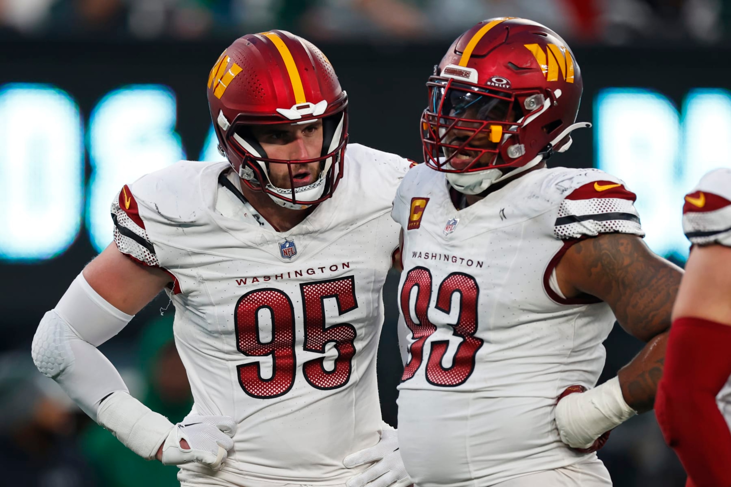 EAST RUTHERFORD, NEW JERSEY - DECEMBER 24: Casey Toohill #95 and Jonathan Allen #93 of the Washington Commanders in action against the New York Jets during a game at MetLife Stadium on December 24, 2023 in East Rutherford, New Jersey. (Photo by Rich Schultz/Getty Images)