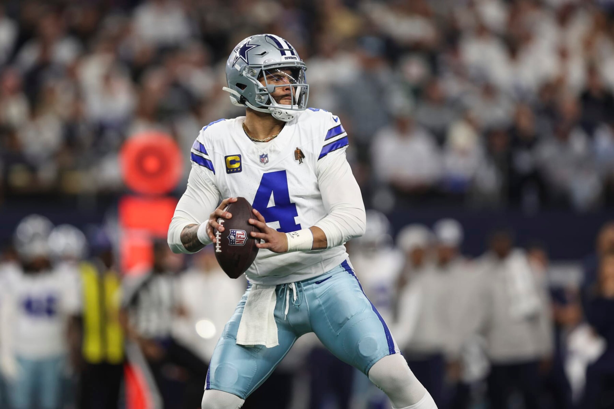 ARLINGTON, TX - JANUARY 14: Dak Prescott #4 of the Dallas Cowboys throws the ball during an NFL wild-card playoff football game against the Green Bay Packers at AT&T Stadium on January 14, 2024 in Arlington, Texas. (Photo by Perry Knotts/Getty Images)