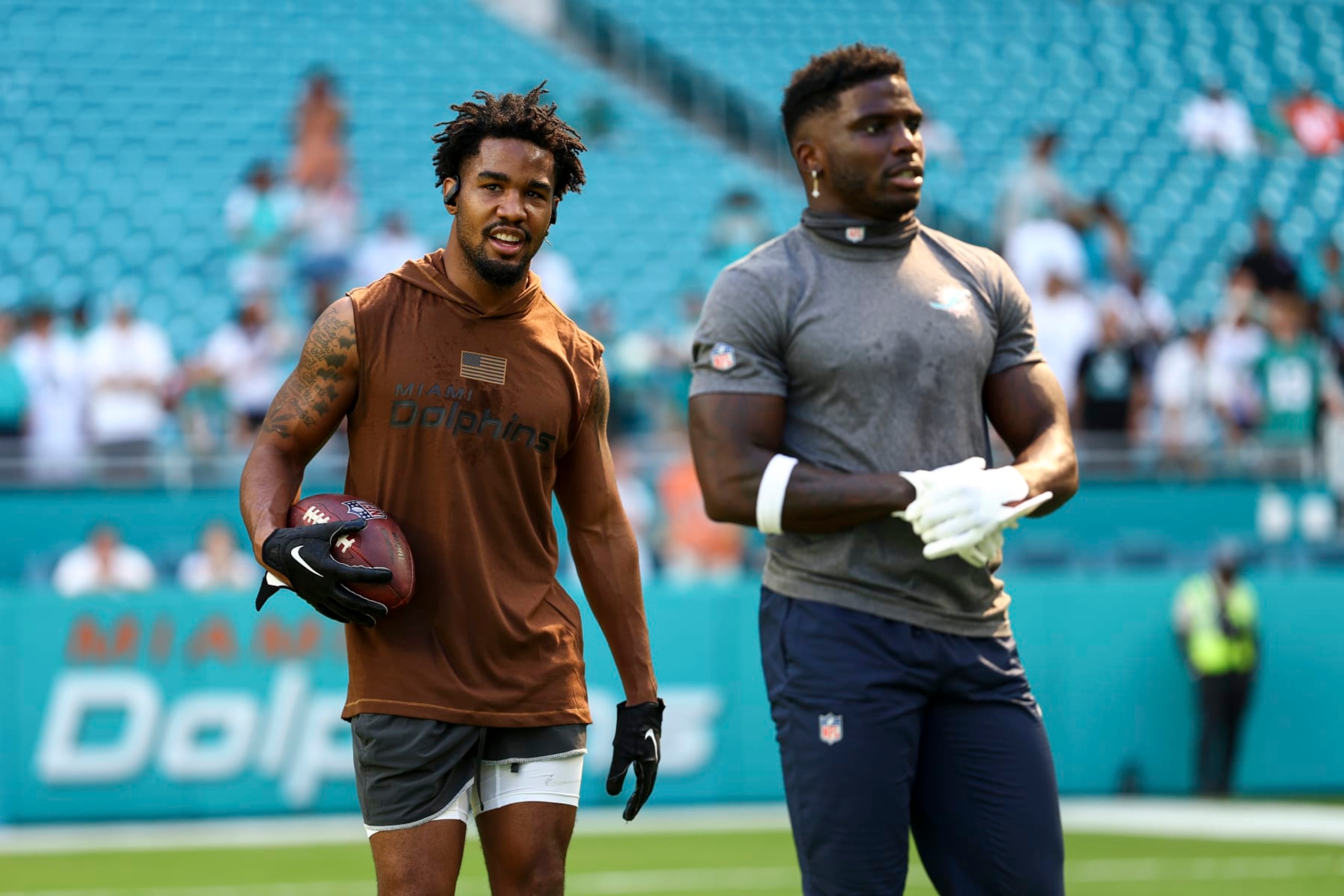 MIAMI GARDENS, FL - NOVEMBER 19: Jaylen Waddle #17 and Tyreek Hill #10 of the Miami Dolphins warm up prior to an NFL football game against the Las Vegas Raiders at Hard Rock Stadium on November 19, 2023 in Miami Gardens, Florida. (Photo by Kevin Sabitus/Getty Images) MIAMI GARDENS, FL - NOVEMBER 19: Jaylen Waddle #17 and Tyreek Hill #10 of the Miami Dolphins warm up prior to an NFL football game against the Las Vegas Raiders at Hard Rock Stadium on November 19, 2023 in Miami Gardens, Florida. (Photo by Kevin Sabitus/Getty Images)
