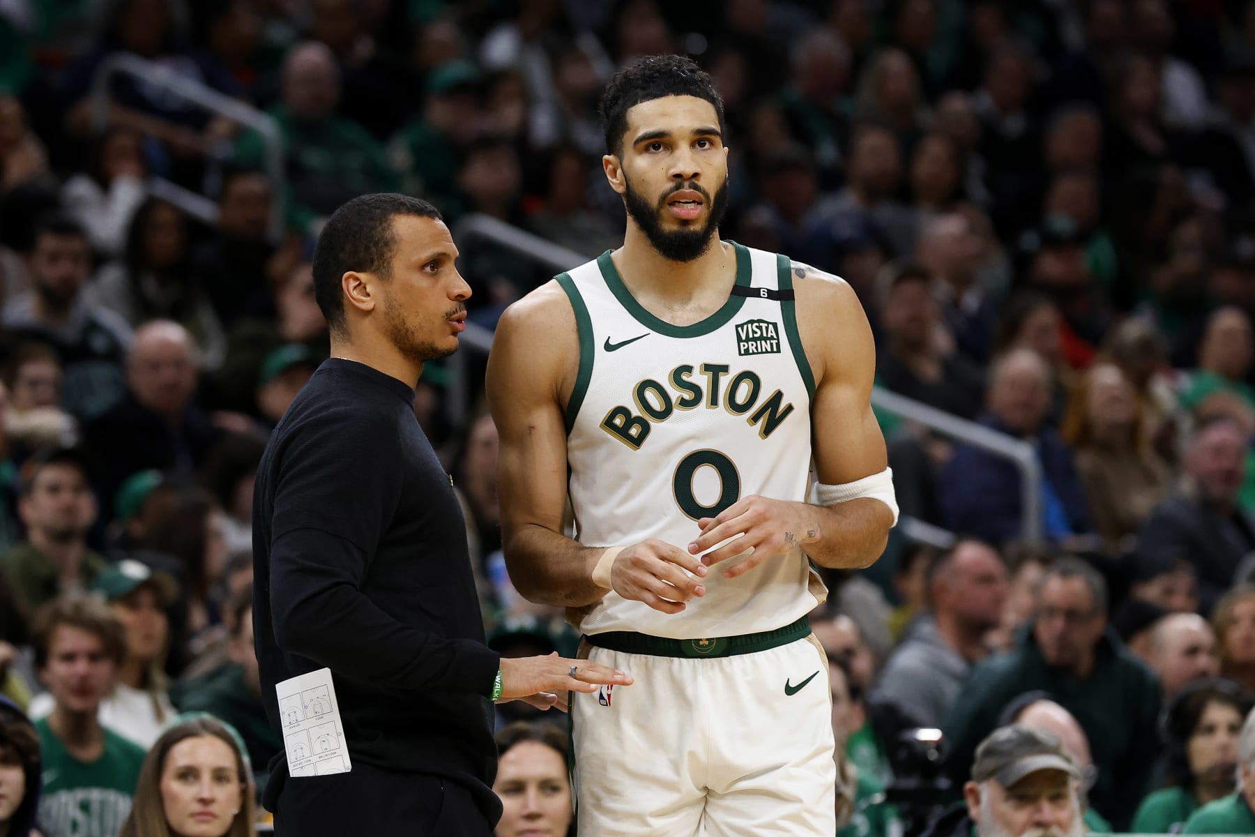 BOSTON, MA - FEBRUARY 09: Boston Celtics head coach Joe Mazzulla talks with Jayson Tatum #0 during the second half of their win over the Washington Wizards at TD Garden on February 9, 2024 in Boston, Massachusetts. NOTE TO USER: User expressly acknowledges and agrees that, by downloading and/or using this Photograph, user is consenting to the terms and conditions of the Getty Images License Agreement. (Photo By Winslow Townson/Getty Images)