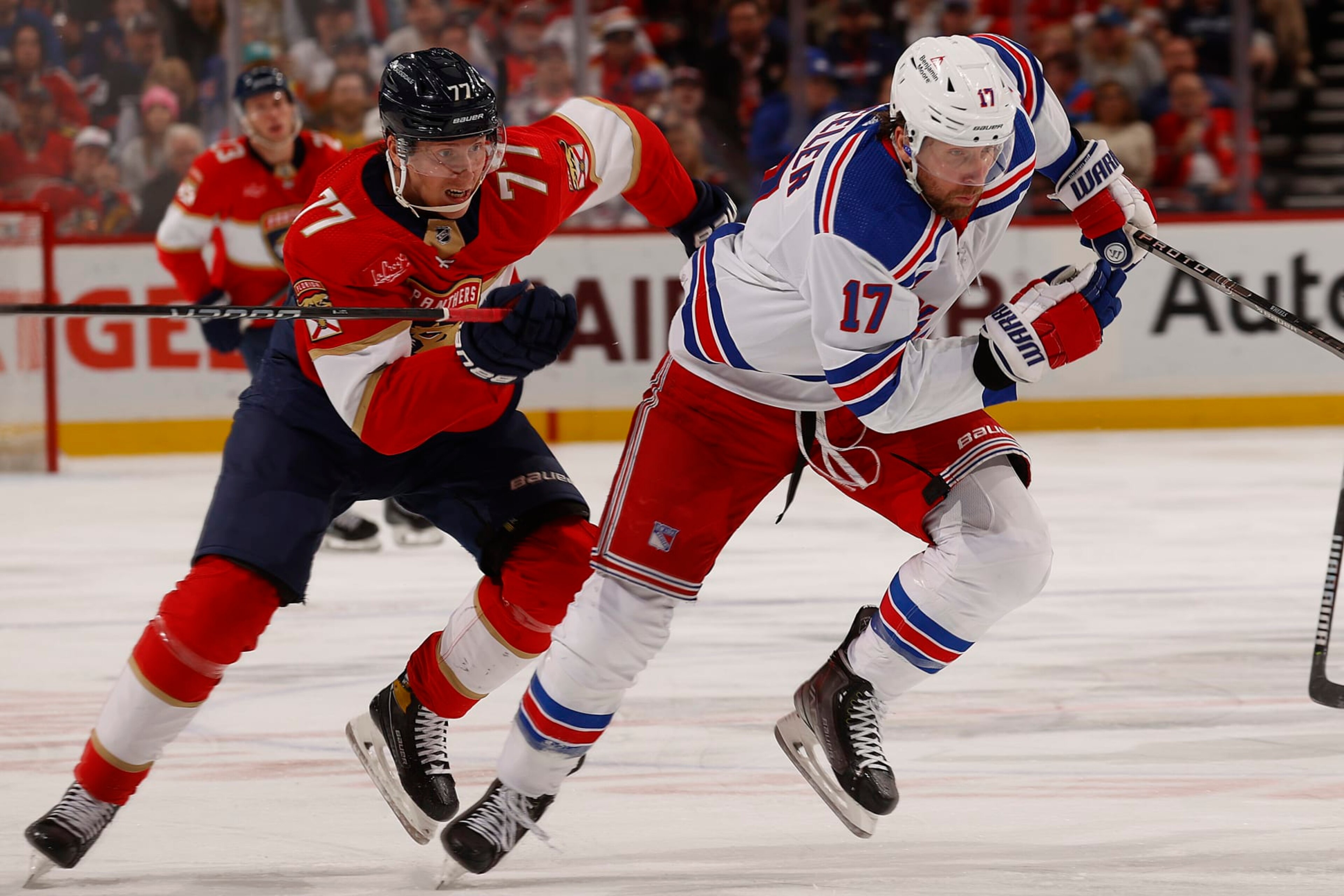 SUNRISE, FLORIDA - DECEMBER 29: Blake Wheeler #17 of the New York Rangers skates for position against Niko Mikkola #77 of the Florida Panthers at the Amerant Bank Arena on December 29, 2023 in Sunrise, Florida. (Photo by Eliot J. Schechter/NHLI via Getty Images) SUNRISE, FLORIDA - DECEMBER 29: Blake Wheeler #17 of the New York Rangers skates for position against Niko Mikkola #77 of the Florida Panthers at the Amerant Bank Arena on December 29, 2023 in Sunrise, Florida. (Photo by Eliot J. Schechter/NHLI via Getty Images)