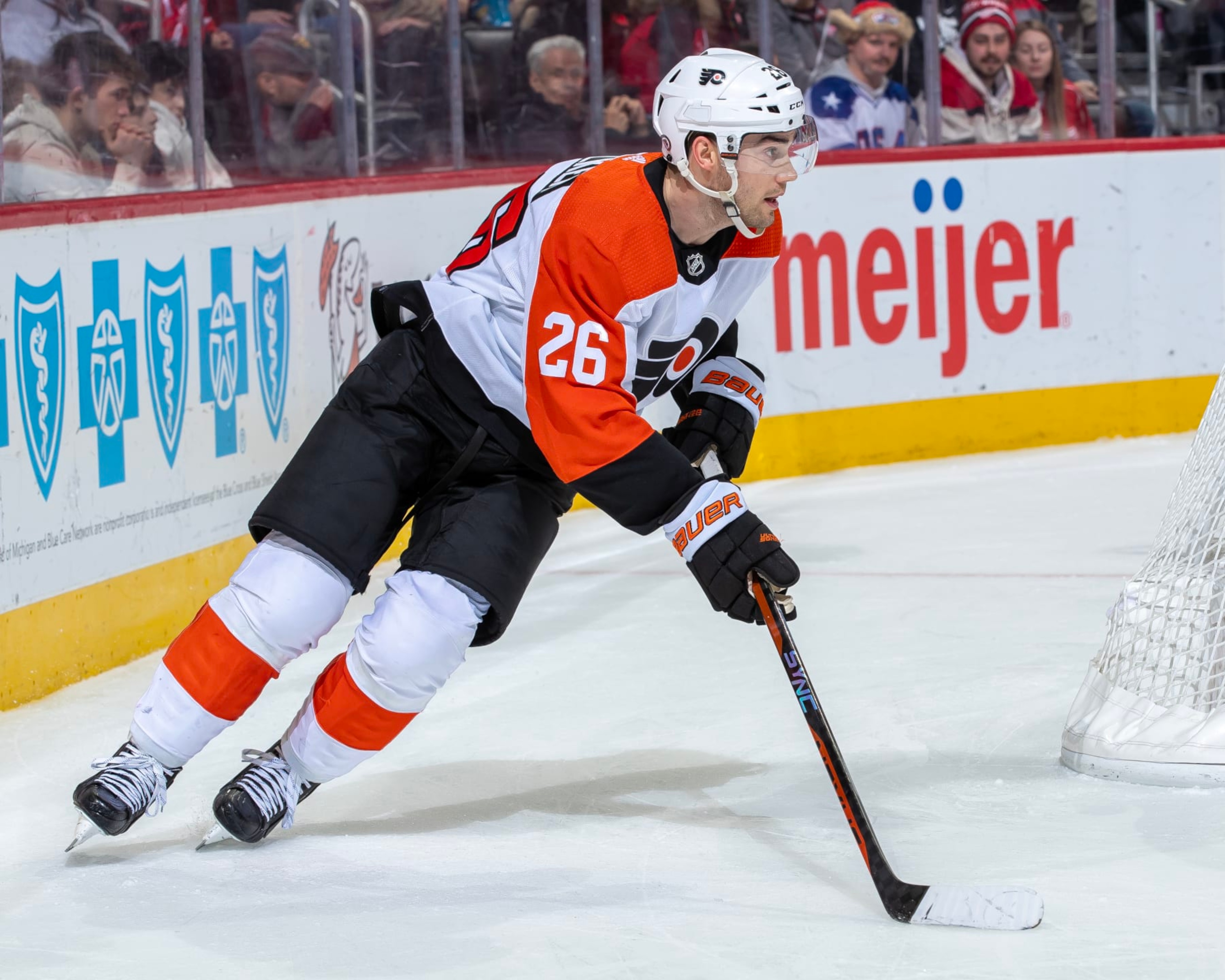 DETROIT, MI - JANUARY 25: Sean Walker #26 of the Philadelphia Flyers skates around the net with the puck against the Detroit Red Wings during the third period at Little Caesars Arena on January 25, 2024 in Detroit, Michigan. Detroit defeated Philadelphia 3-0. (Photo by Dave Reginek/NHLI via Getty Images) DETROIT, MI - JANUARY 25: Sean Walker #26 of the Philadelphia Flyers skates around the net with the puck against the Detroit Red Wings during the third period at Little Caesars Arena on January 25, 2024 in Detroit, Michigan. Detroit defeated Philadelphia 3-0. (Photo by Dave Reginek/NHLI via Getty Images)