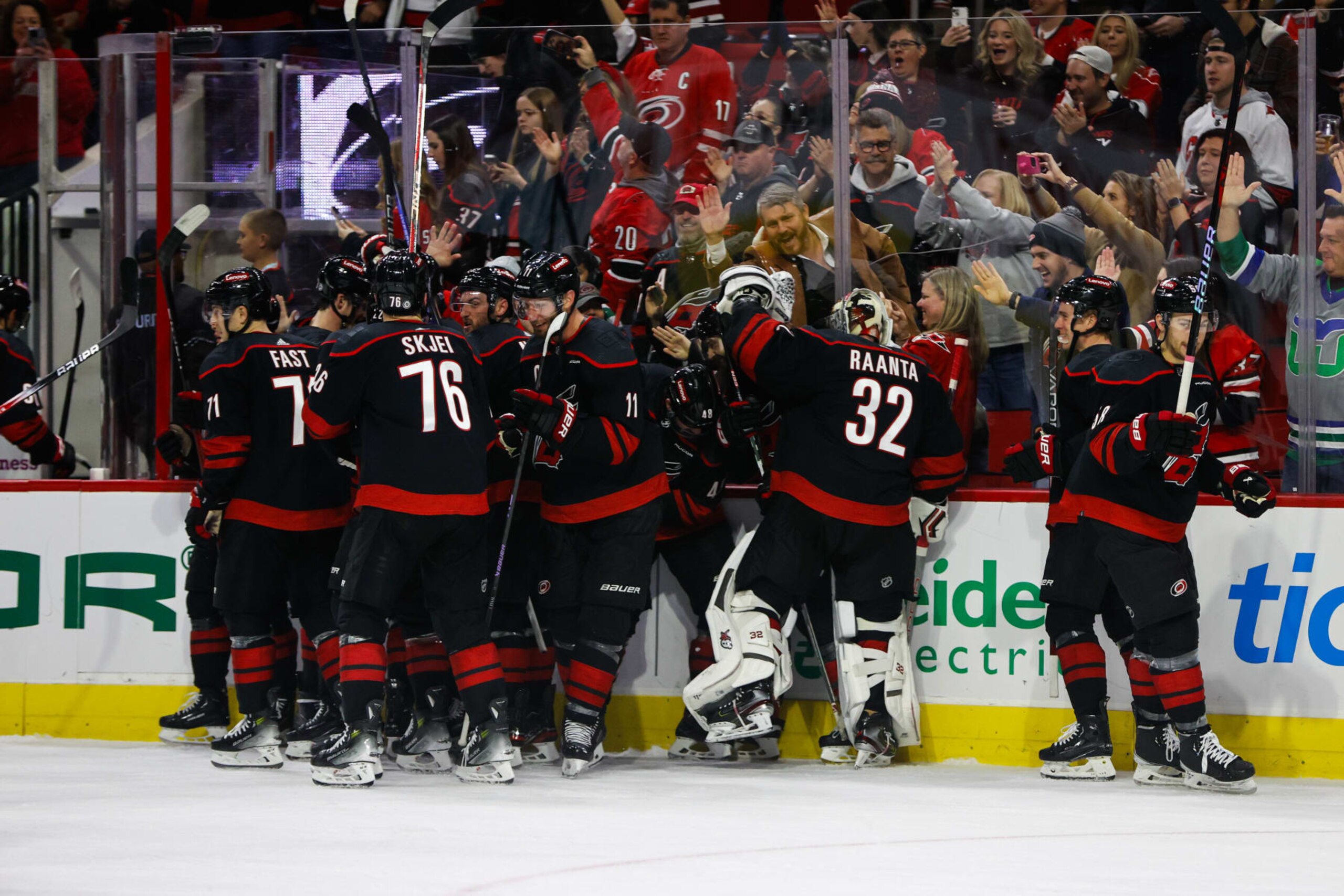 RALEIGH, NC - JANUARY 19: Carolina Hurricanes celebrates a win after the third period of the game against the Detroit Red Wings at PNC Arena on January 19, 2024 in Raleigh, North Carolina. (Photo by Jaylynn Nash/Getty Images)*** Local Caption ***