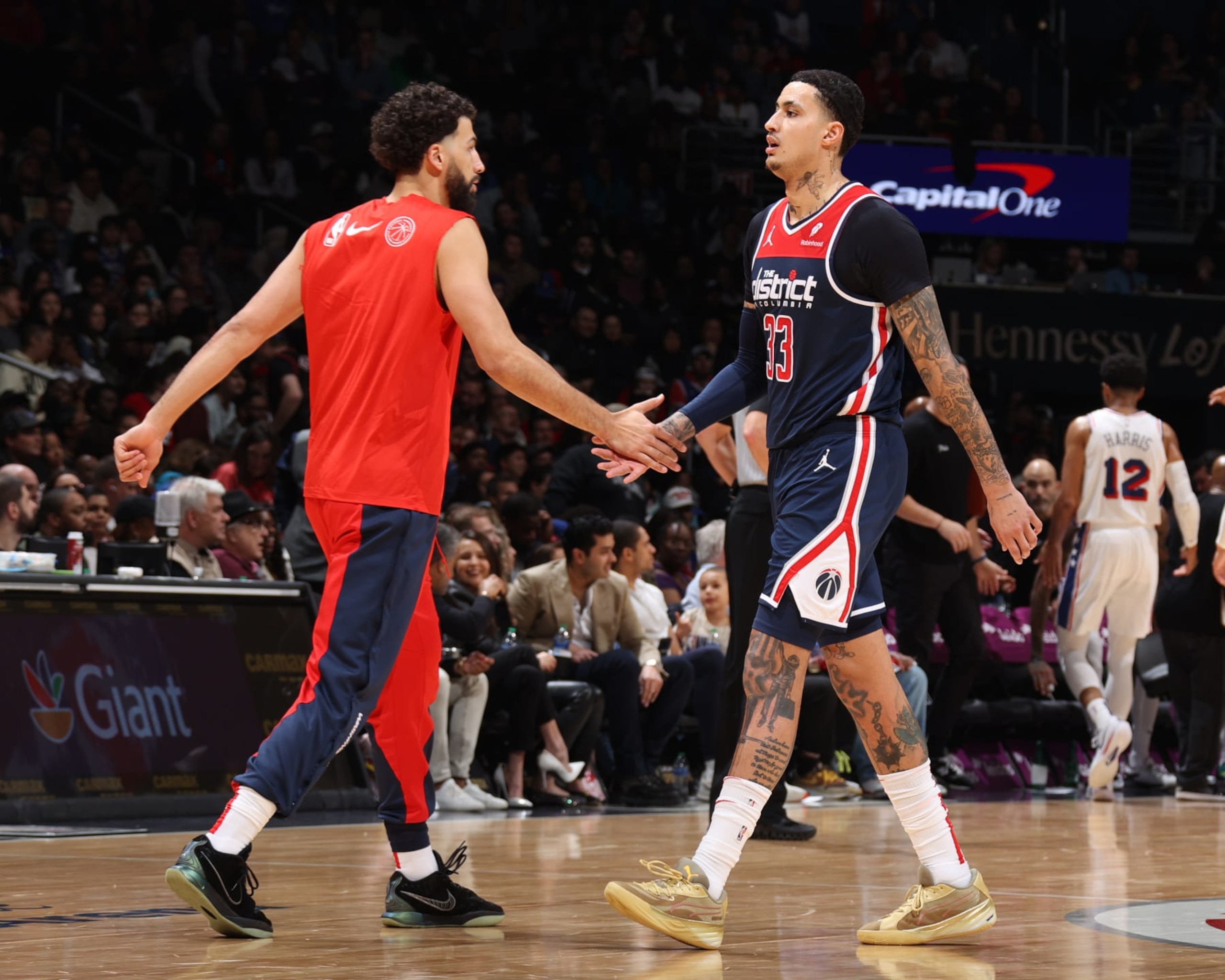 WASHINGTON, DC -  FEBRUARY 10: Anthony Gill #16 high fives Kyle Kuzma #33 of the Washington Wizards during the game against the Philadelphia 76ers on February 10, 2024 at Capital One Arena in Washington, DC. NOTE TO USER: User expressly acknowledges and agrees that, by downloading and or using this Photograph, user is consenting to the terms and conditions of the Getty Images License Agreement. Mandatory Copyright Notice: Copyright 2024 NBAE (Photo by Stephen Gosling/NBAE via Getty Images)
