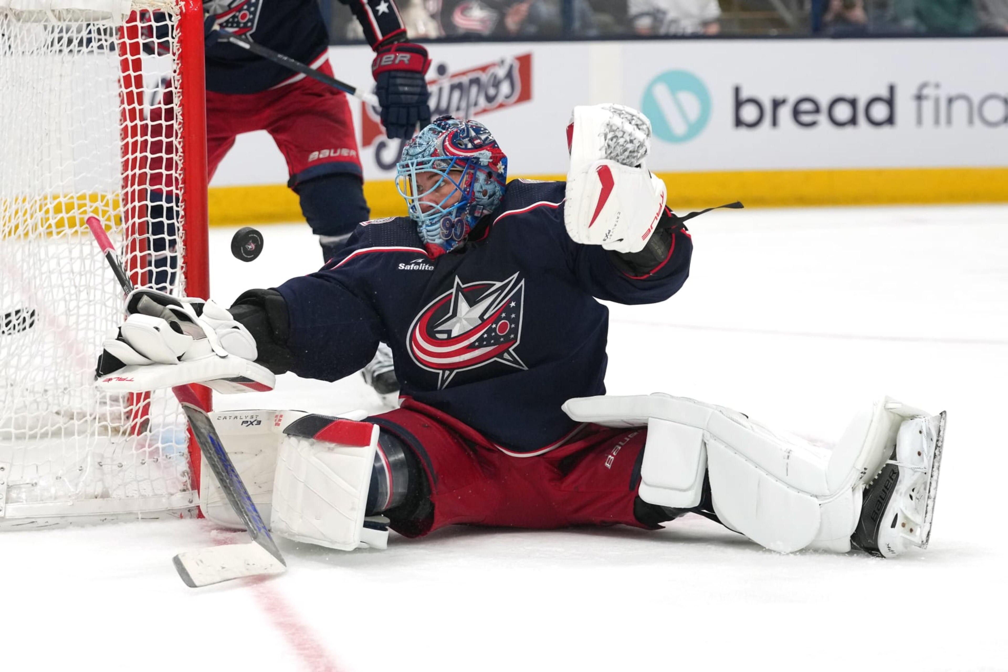 COLUMBUS, OHIO - FEBRUARY 10: Elvis Merzlikins #90 of the Columbus Blue Jackets attempts to make as save in third period against the Tampa Bay Lightning at Nationwide Arena on February 10, 2024 in Columbus, Ohio. (Photo by Jason Mowry/Getty Images) COLUMBUS, OHIO - FEBRUARY 10: Elvis Merzlikins #90 of the Columbus Blue Jackets attempts to make as save in third period against the Tampa Bay Lightning at Nationwide Arena on February 10, 2024 in Columbus, Ohio. (Photo by Jason Mowry/Getty Images)