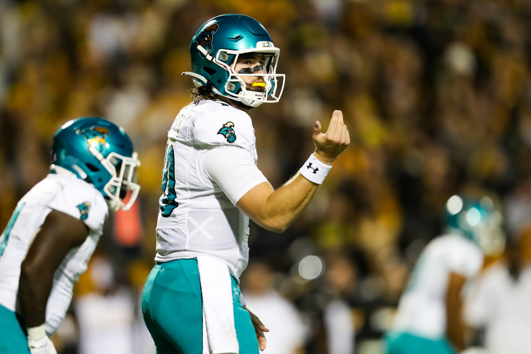 BOONE, NC - OCTOBER 10: Grayson McCall #10 of the Coastal Carolina Chanticleers signals for a play during a football game against the Appalachian State Mountaineers at Kidd Brewer Stadium in Boone, North Carolina on Oct 10, 2023. (Photo by David Jensen/Icon Sportswire via Getty Images)