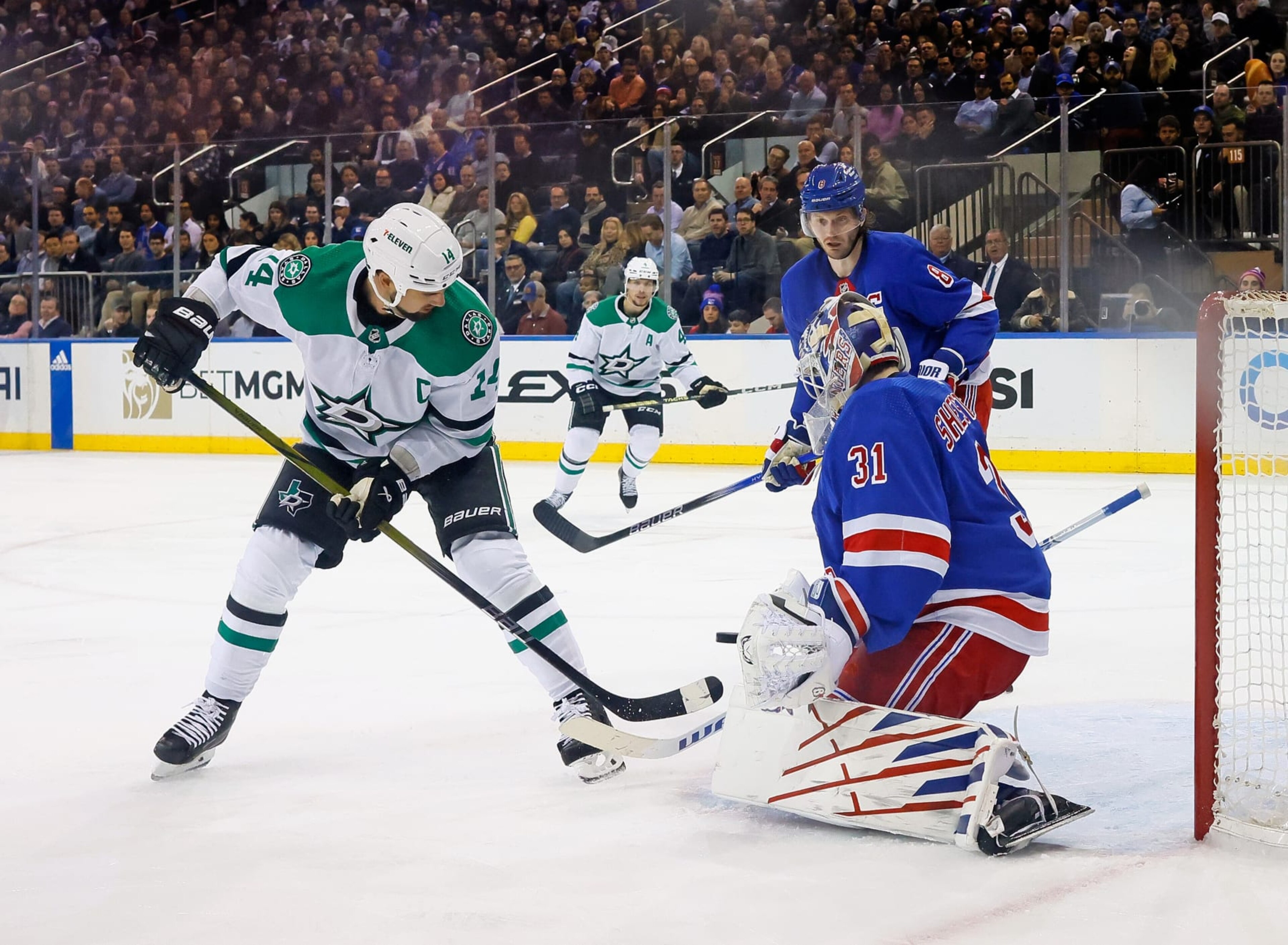NEW YORK, NEW YORK - FEBRUARY 20: Igor Shesterkin #31 of the New York Rangers makes the second period save on Jamie Benn #14 of the Dallas Stars at Madison Square Garden on February 20, 2024 in New York City. The Rangers defeated the Stars 3-1. (Photo by Bruce Bennett/Getty Images) NEW YORK, NEW YORK - FEBRUARY 20: Igor Shesterkin #31 of the New York Rangers makes the second period save on Jamie Benn #14 of the Dallas Stars at Madison Square Garden on February 20, 2024 in New York City. The Rangers defeated the Stars 3-1. (Photo by Bruce Bennett/Getty Images)