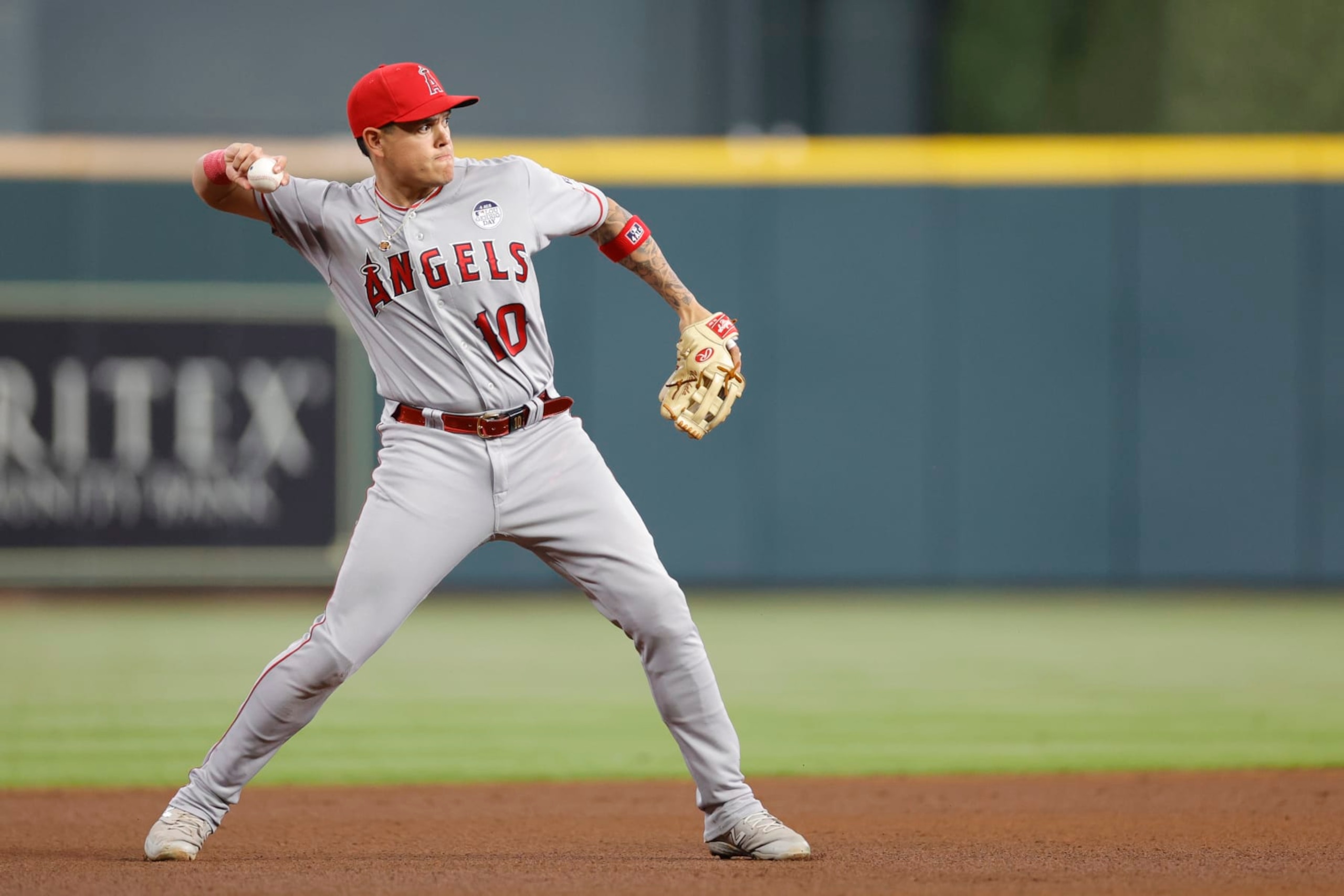 HOUSTON, TEXAS - JUNE 02: Gio Urshela #10 of the Los Angeles Angels fields a ground ball hit by Alex Bregman #2 of the Houston Astros at Minute Maid Park on June 02, 2023 in Houston, Texas. (Photo by Carmen Mandato/Getty Images)