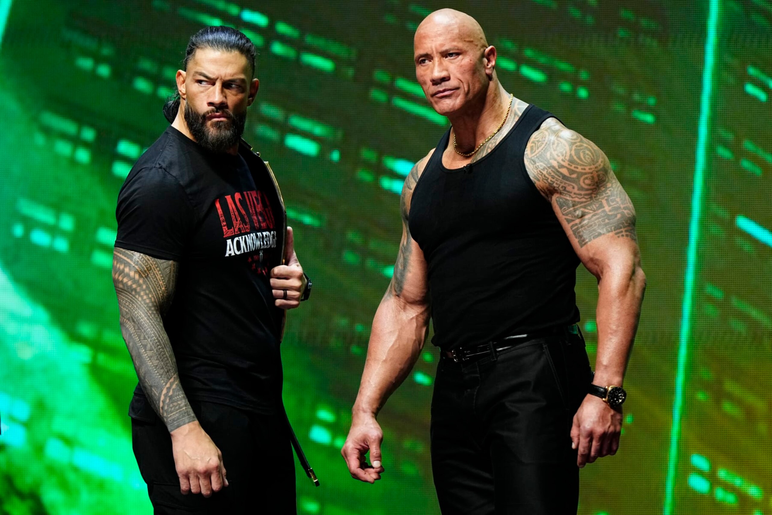 LAS VEGAS, NV - FEBRUARY 08:  Dwayne "The Rock" Johnson and Roman Reigns during the WWE Wrestlemania XL Kickoff on February 08, 2024, at T-Mobile Arena in Las Vegas, NV. (Photo by Louis Grasse/PXimages/Icon Sportswire via Getty Images)