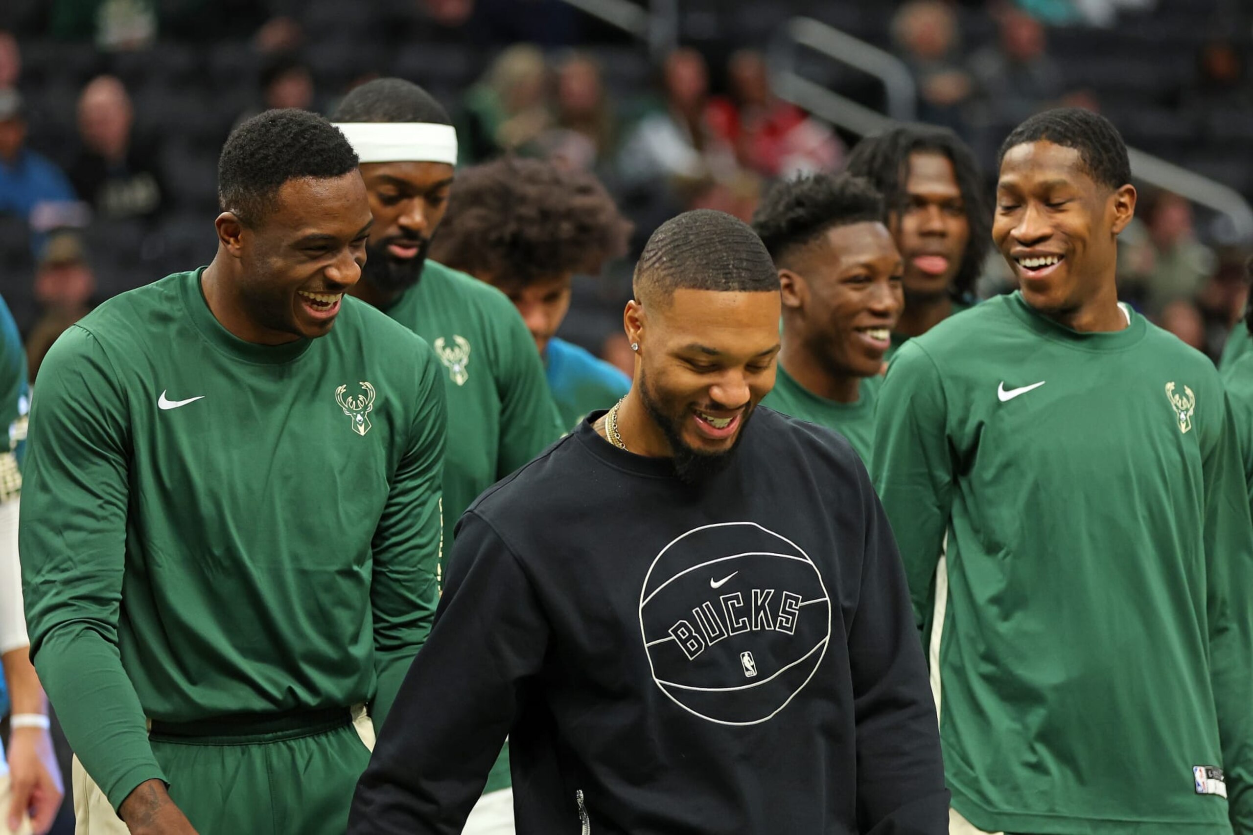 MILWAUKEE, WISCONSIN - OCTOBER 08: Thanasis Antetokounmpo #43 speaks with Damian Lillard #0 of the Milwaukee Bucks prior to a preseason game against the Chicago Bulls at Fiserv Forum on October 08, 2023 in Milwaukee, Wisconsin. NOTE TO USER: User expressly acknowledges and agrees that, by downloading and or using this photograph, User is consenting to the terms and conditions of the Getty Images License Agreement. (Photo by Stacy Revere/Getty Images)