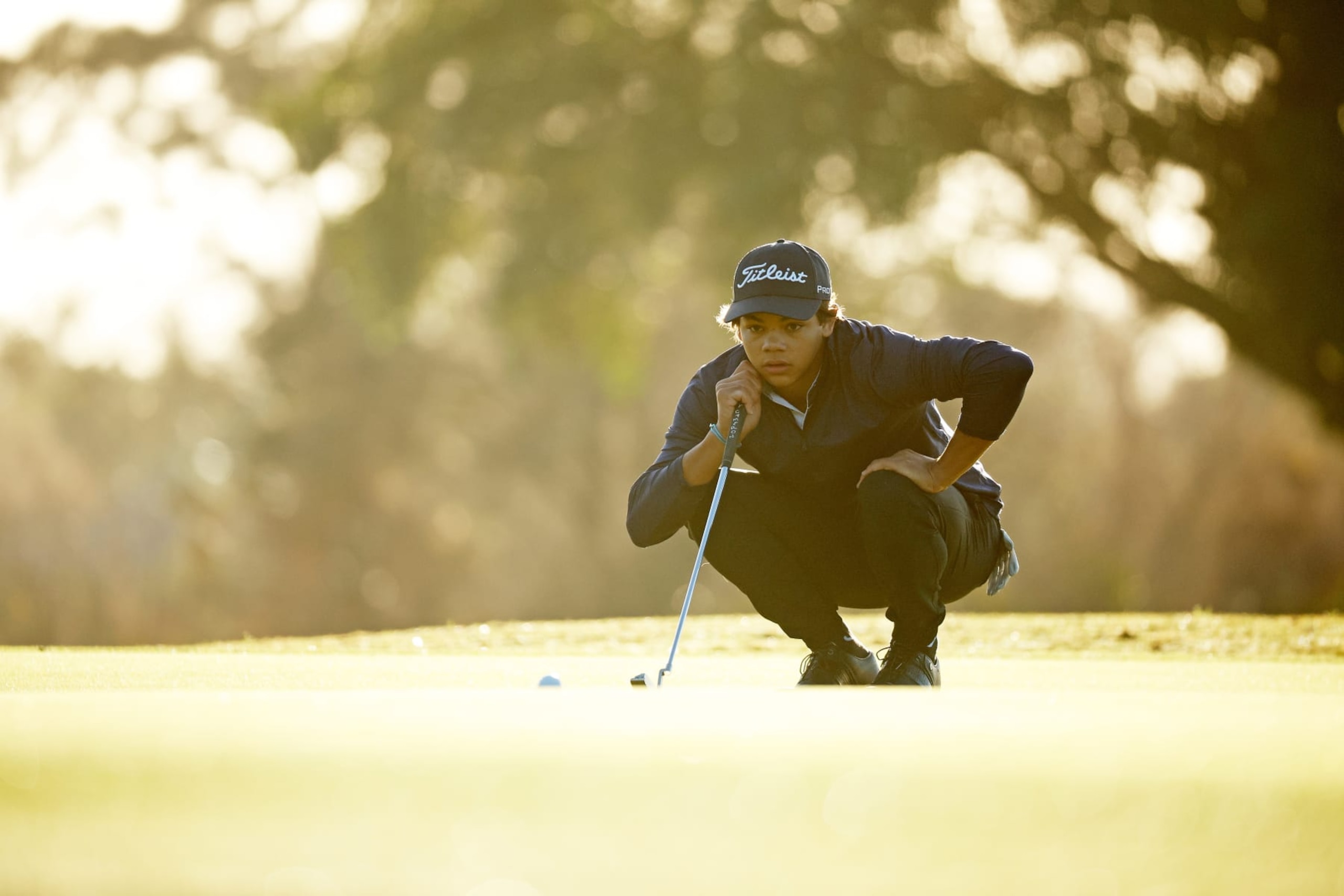 HOBE SOUND, FLORIDA - FEBRUARY 22: Charlie Woods lines up a putt on the firs green during pre-qualifying for The Cognizant Classic in The Palm Beaches at Lost Lake Golf Club on February 22, 2024 in Hobe Sound, Florida. (Photo by Cliff Hawkins/Getty Images)