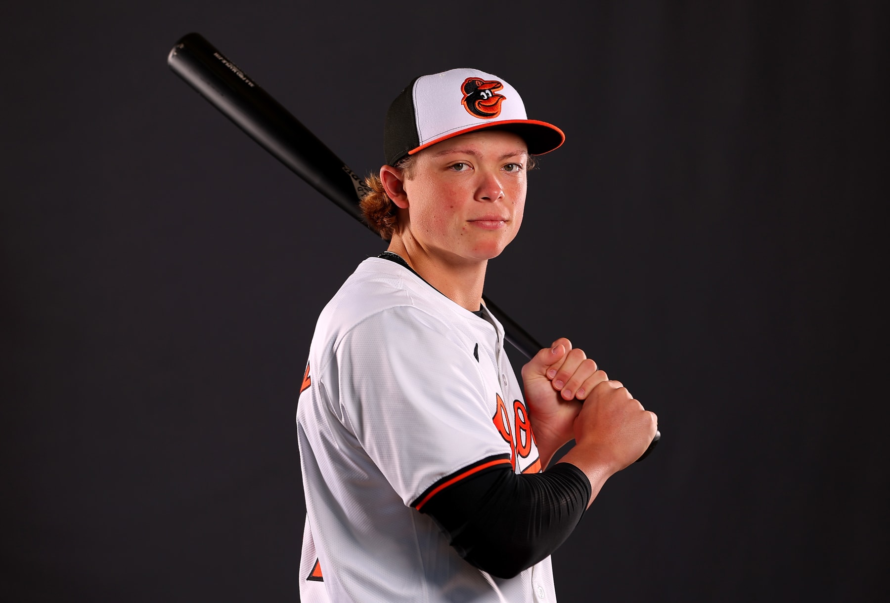 SARASOTA, FLORIDA - FEBRUARY 21:  Jackson Holliday #87 of the Baltimore Orioles poses for a portrait during photo day at Ed Smith Stadium on February 21, 2024 in Sarasota, Florida. (Photo by Kevin C. Cox/Getty Images)