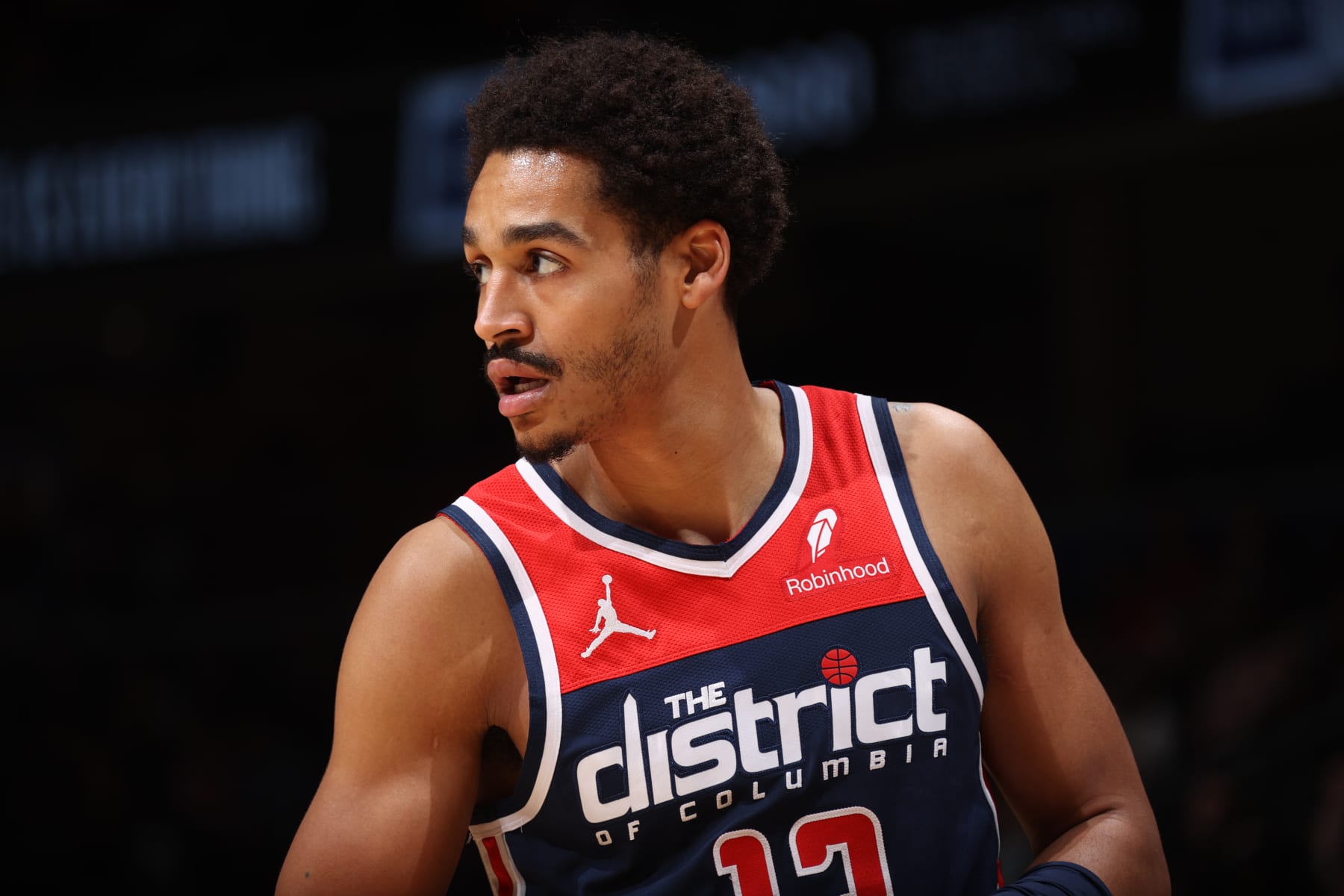 WASHINGTON, DC -  FEBRUARY 10: Jordan Poole #13 of the Washington Wizards looks on during the game against the Philadelphia 76ers on February 10, 2024 at Capital One Arena in Washington, DC. NOTE TO USER: User expressly acknowledges and agrees that, by downloading and or using this Photograph, user is consenting to the terms and conditions of the Getty Images License Agreement. Mandatory Copyright Notice: Copyright 2024 NBAE (Photo by Stephen Gosling/NBAE via Getty Images)

