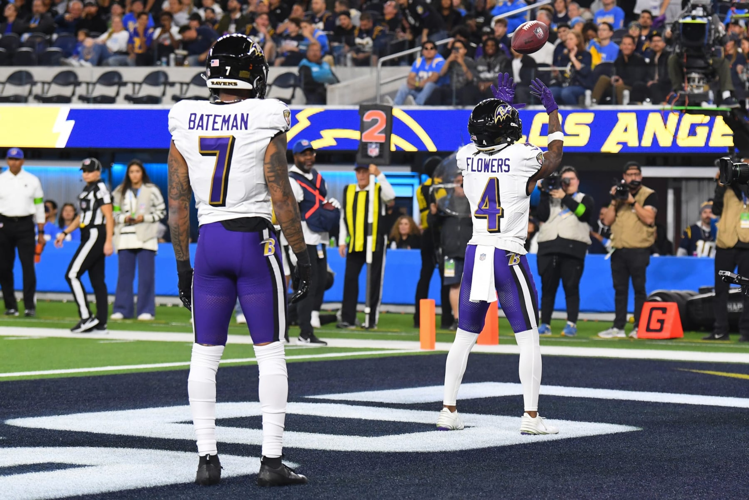 INGLEWOOD, CA - NOVEMBER 26: Baltimore Ravens wide receiver Zay Flowers (4) celebrates with Baltimore Ravens wide receiver Rashod Bateman (7) after a touchdown during the NFL regular season game between the Baltimore Ravens and the Los Angeles Chargers on November 26, 2023, at SoFi Stadium in Inglewood, CA. (Photo by Brian Rothmuller/Icon Sportswire via Getty Images)