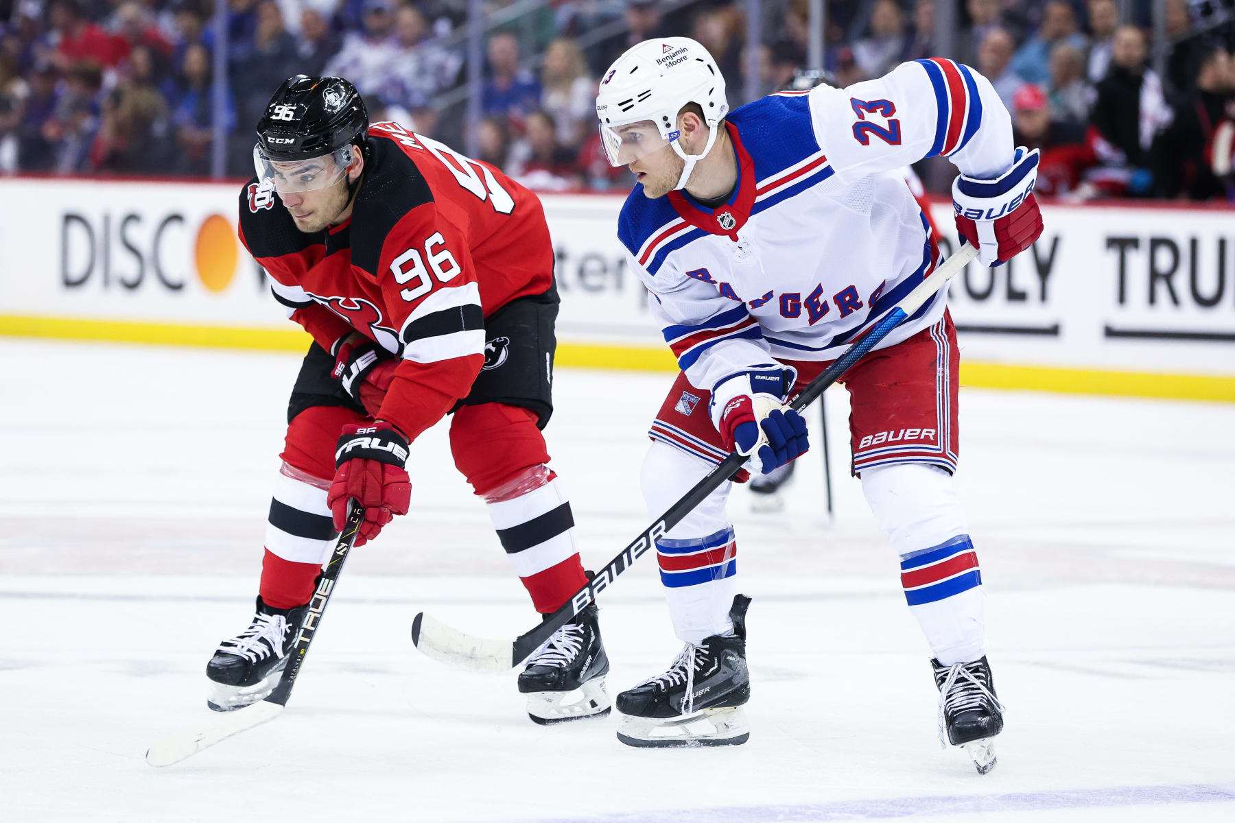NEWARK, NJ - APRIL 20: New Jersey Devils right wing Timo Meier (96) and New York Rangers defenseman Adam Fox (23) wait for a face-off during the National Hockey League game between the New York Rangers and the New Jersey Devils on April 20, 2023 at Prudential Center in Newark, NJ. (Photo by Andrew Mordzynski/Icon Sportswire via Getty Images)