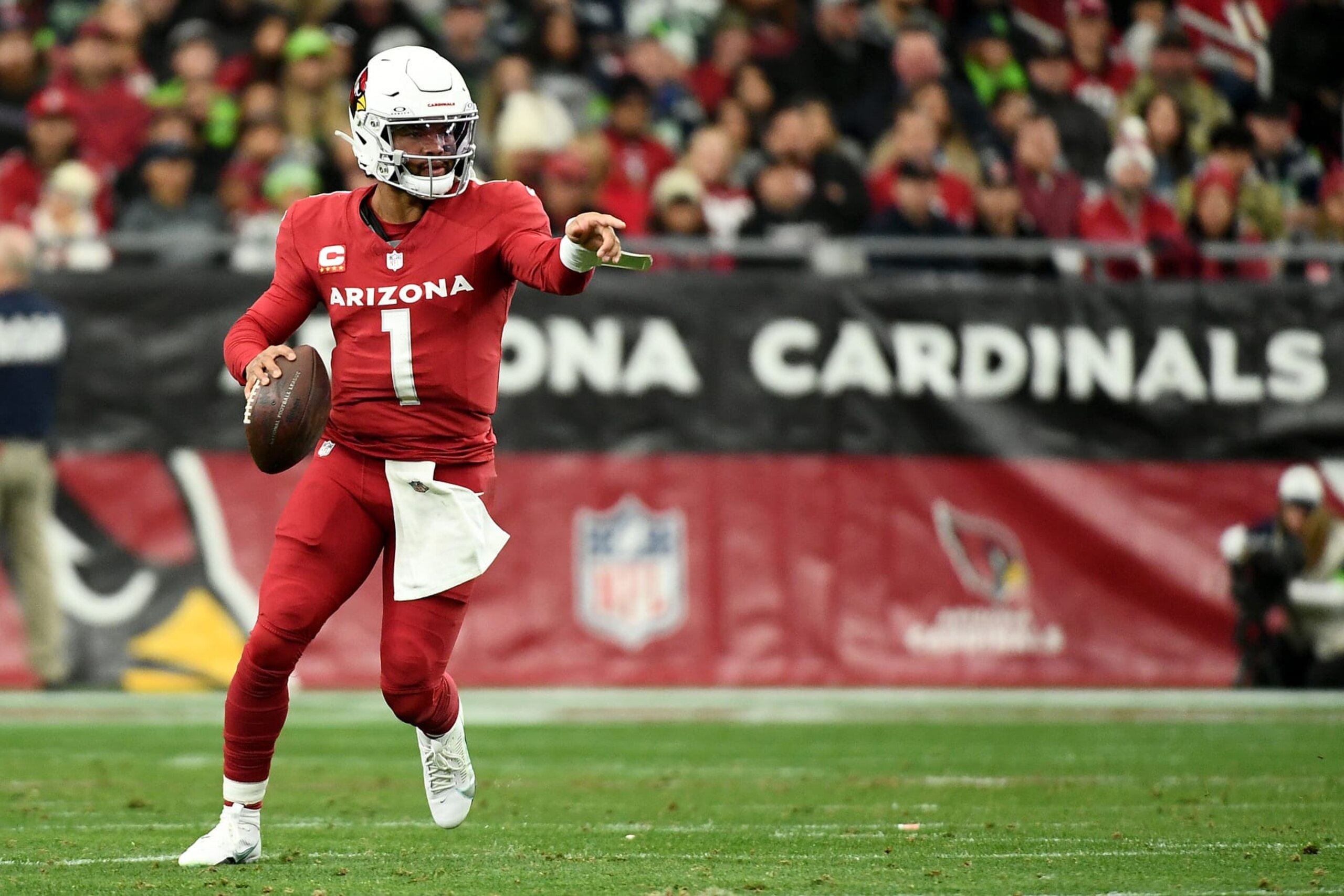 GLENDALE, ARIZONA - JANUARY 07: Kyler Murray #1 of the Arizona Cardinals runs with the ball during the first half against the Seattle Seahawks at State Farm Stadium on January 07, 2024 in Glendale, Arizona. (Photo by Jennifer Stewart/Getty Images) GLENDALE, ARIZONA - JANUARY 07: Kyler Murray #1 of the Arizona Cardinals runs with the ball during the first half against the Seattle Seahawks at State Farm Stadium on January 07, 2024 in Glendale, Arizona. (Photo by Jennifer Stewart/Getty Images)