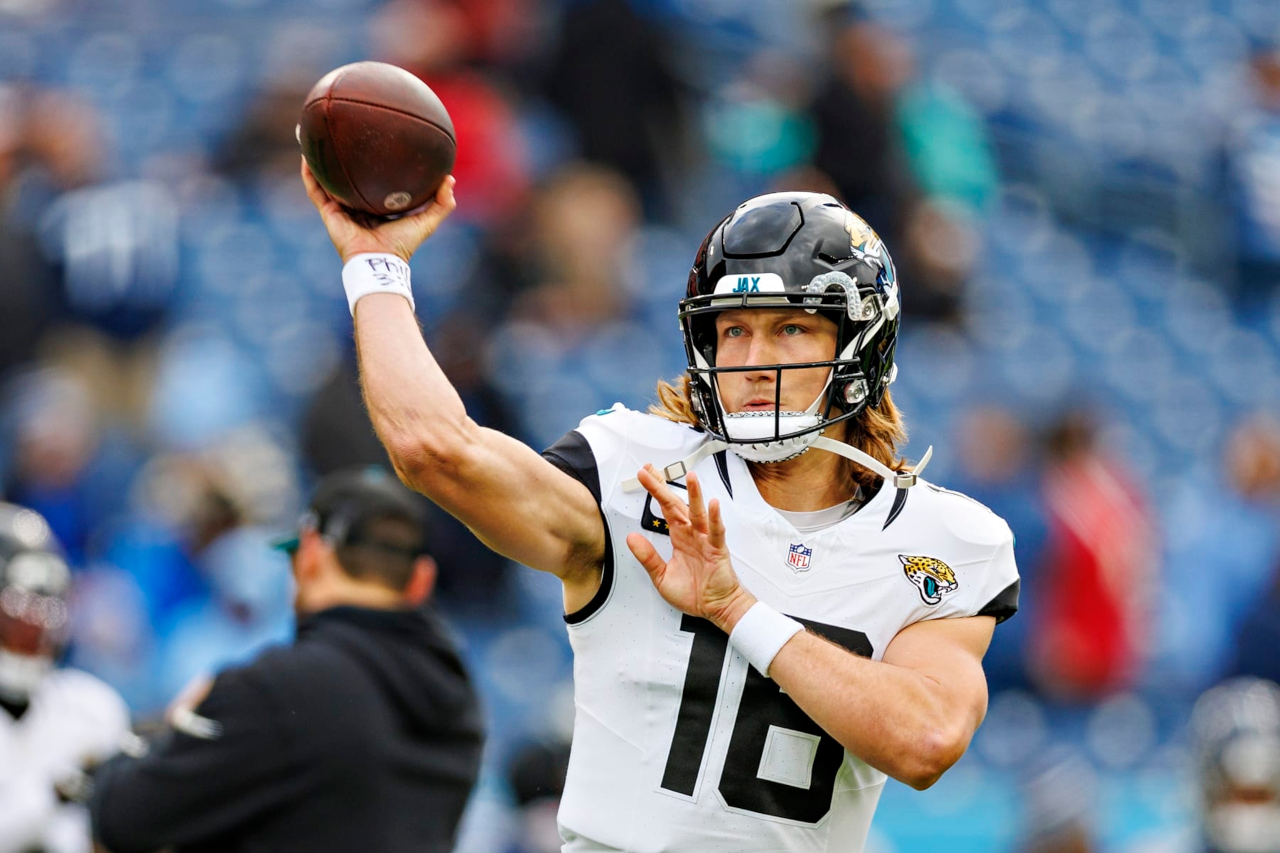 NASHVILLE TENNESSEE - JANUARY 07: Trevor Lawrence #16 of the Jacksonville Jaguars warms up before the game against the Tennessee Titans in Nashville, Tennessee at Nissan Stadium on January 7, 2024 in Houston, Texas. The Titans defeated the Jaguars 28-20. (Photo by Wesley Hitt/Getty Images) NASHVILLE TENNESSEE - JANUARY 07: Trevor Lawrence #16 of the Jacksonville Jaguars warms up before the game against the Tennessee Titans in Nashville, Tennessee at Nissan Stadium on January 7, 2024 in Houston, Texas. The Titans defeated the Jaguars 28-20. (Photo by Wesley Hitt/Getty Images)
