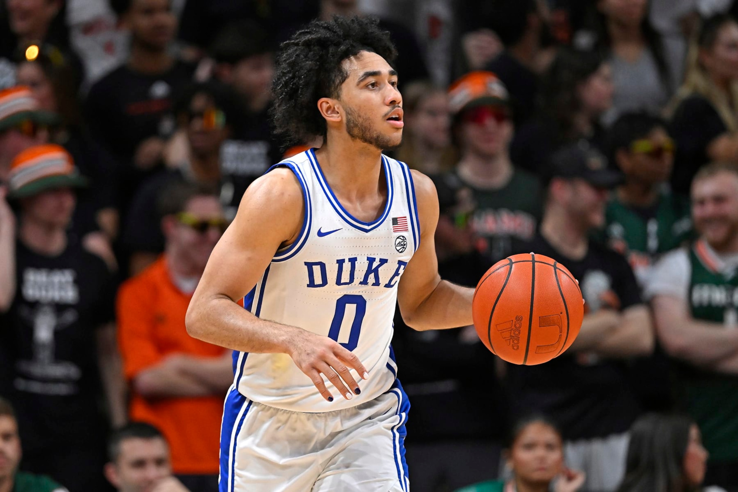 CORAL GABLES, FL - FEBRUARY 21: Duke guard Jared McCain (0) handles the ball in the second half as the Miami Hurricanes faced the Duke Blue Devils on February 21, 2024, at the Watsco Center in Coral Gables, Florida. (Photo by Samuel Lewis/Icon Sportswire via Getty Images)