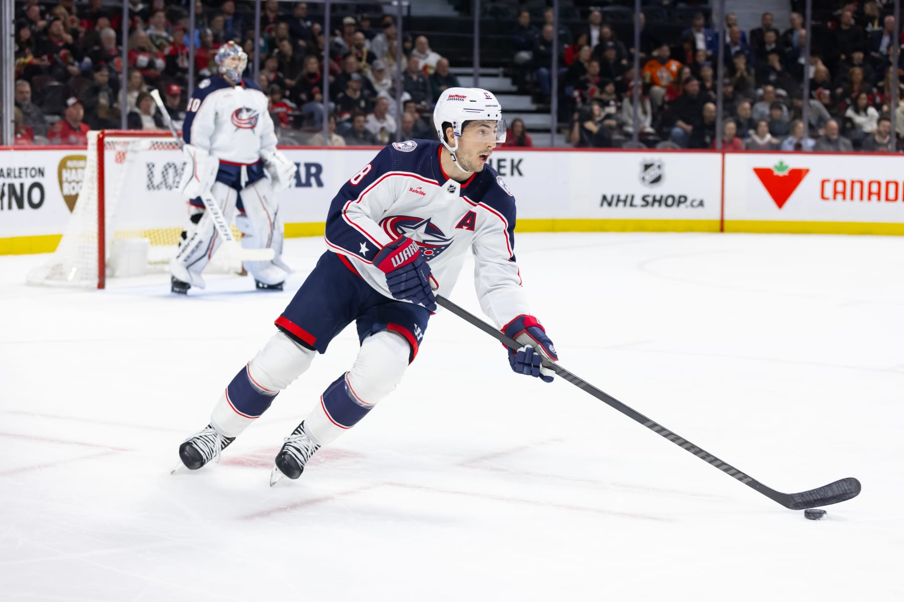OTTAWA, ON - FEBRUARY 13: Columbus Blue Jackets Defenceman Zach Werenski (8) skates with the puck during first period National Hockey League action between the Columbus Blue Jackets and Ottawa Senators on February 13, 2024, at Canadian Tire Centre in Ottawa, ON, Canada. (Photo by Richard A. Whittaker/Icon Sportswire via Getty Images)