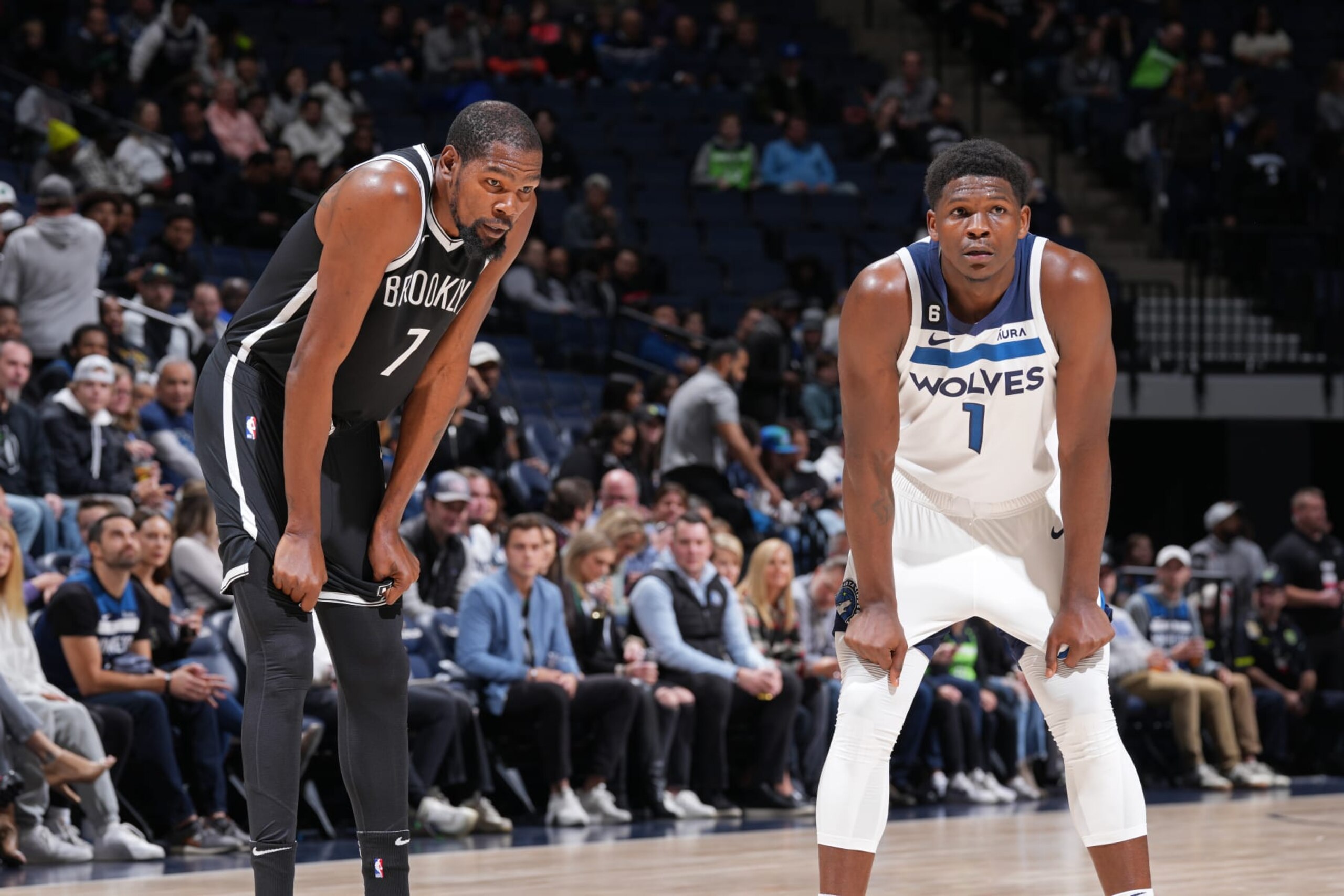 MINNEAPOLIS, MN - OCTOBER 14: Kevin Durant #7 of the Brooklyn Nets and Anthony Edwards #1 of the Minnesota Timberwolves look on during the preseason game on October 14, 2022 at Target Center in Minneapolis, Minnesota. NOTE TO USER: User expressly acknowledges and agrees that, by downloading and or using this Photograph, user is consenting to the terms and conditions of the Getty Images License Agreement. Mandatory Copyright Notice: Copyright 2022 NBAE (Photo by Jordan Johnson/NBAE via Getty Images) MINNEAPOLIS, MN - OCTOBER 14: Kevin Durant #7 of the Brooklyn Nets and Anthony Edwards #1 of the Minnesota Timberwolves look on during the preseason game on October 14, 2022 at Target Center in Minneapolis, Minnesota. NOTE TO USER: User expressly acknowledges and agrees that, by downloading and or using this Photograph, user is consenting to the terms and conditions of the Getty Images License Agreement. Mandatory Copyright Notice: Copyright 2022 NBAE (Photo by Jordan Johnson/NBAE via Getty Images)