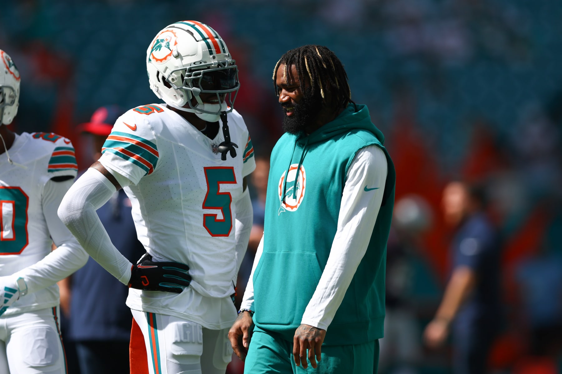 MIAMI GARDENS, FLORIDA - OCTOBER 29: Jalen Ramsey #5 and Xavien Howard #25 of the Miami Dolphins speak on the field prior to a game against the New England Patriots at Hard Rock Stadium on October 29, 2023 in Miami Gardens, Florida. (Photo by Megan Briggs/Getty Images)
