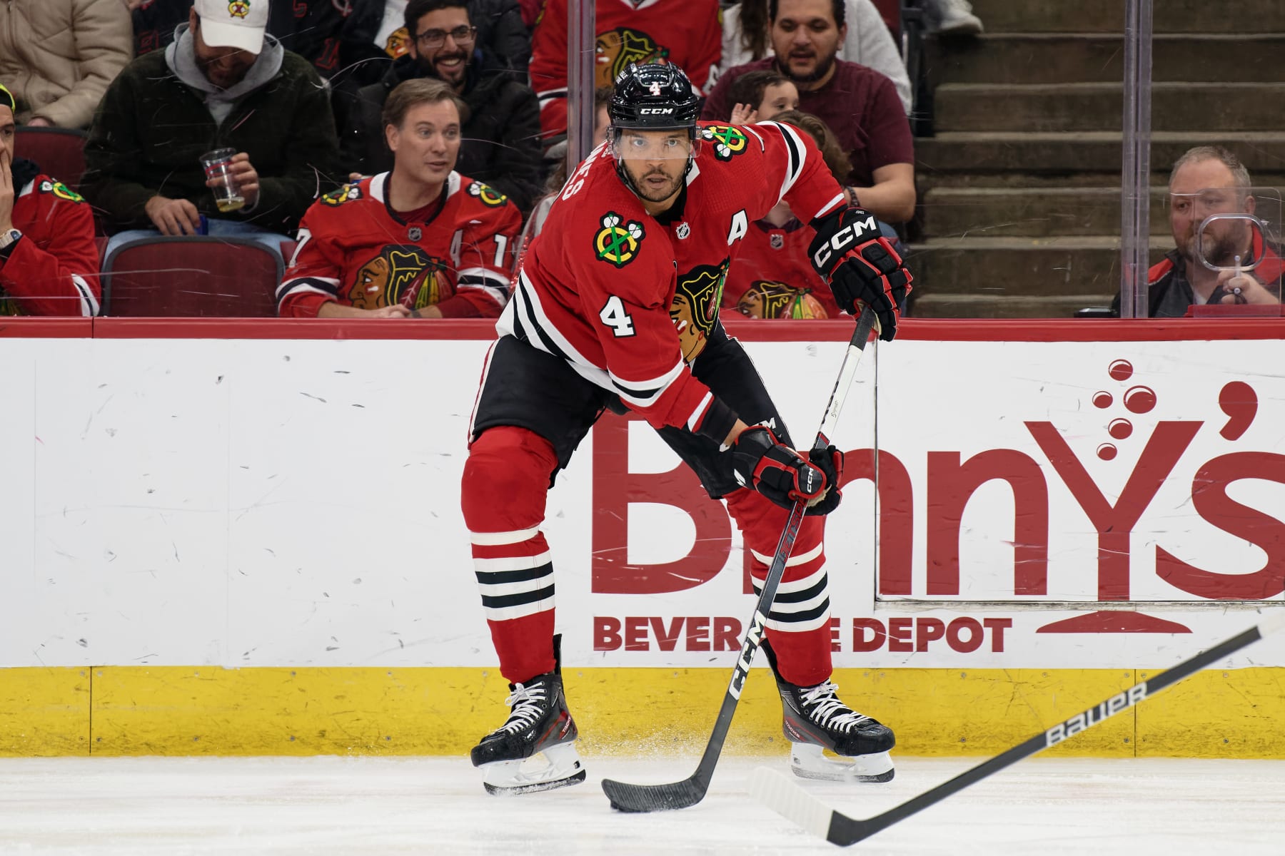 CHICAGO, ILLINOIS - FEBRUARY 21:  Seth Jones #4 of the Chicago Blackhawks skates against the Philadelphia Flyers on February 21, 2024 at United Center in Chicago, Illinois.  (Photo by Jamie Sabau/Getty Images)