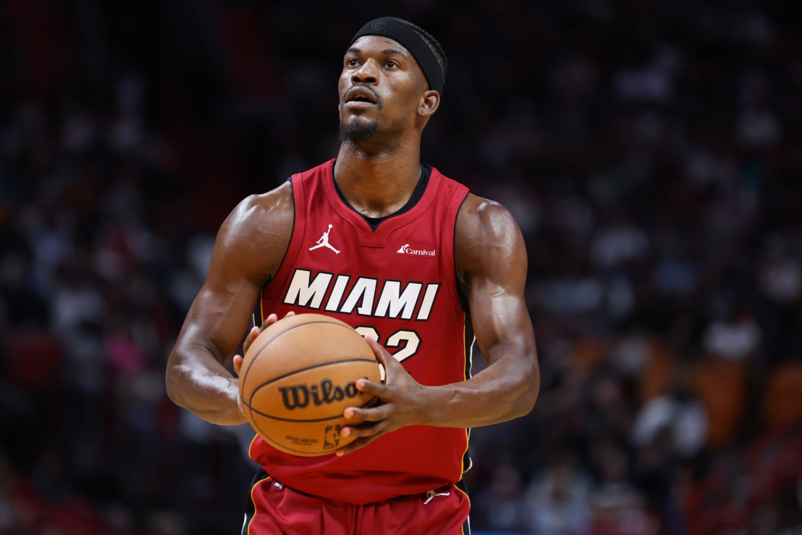 MIAMI, FLORIDA - FEBRUARY 07: Jimmy Butler #22 of the Miami Heat shoots a free throw during the first quarter of the game against the San Antonio Spurs at Kaseya Center on February 07, 2024 in Miami, Florida. NOTE TO USER: User expressly acknowledges and agrees that, by downloading and or using this photograph, User is consenting to the terms and conditions of the Getty Images License Agreement. (Photo by Megan Briggs/Getty Images)