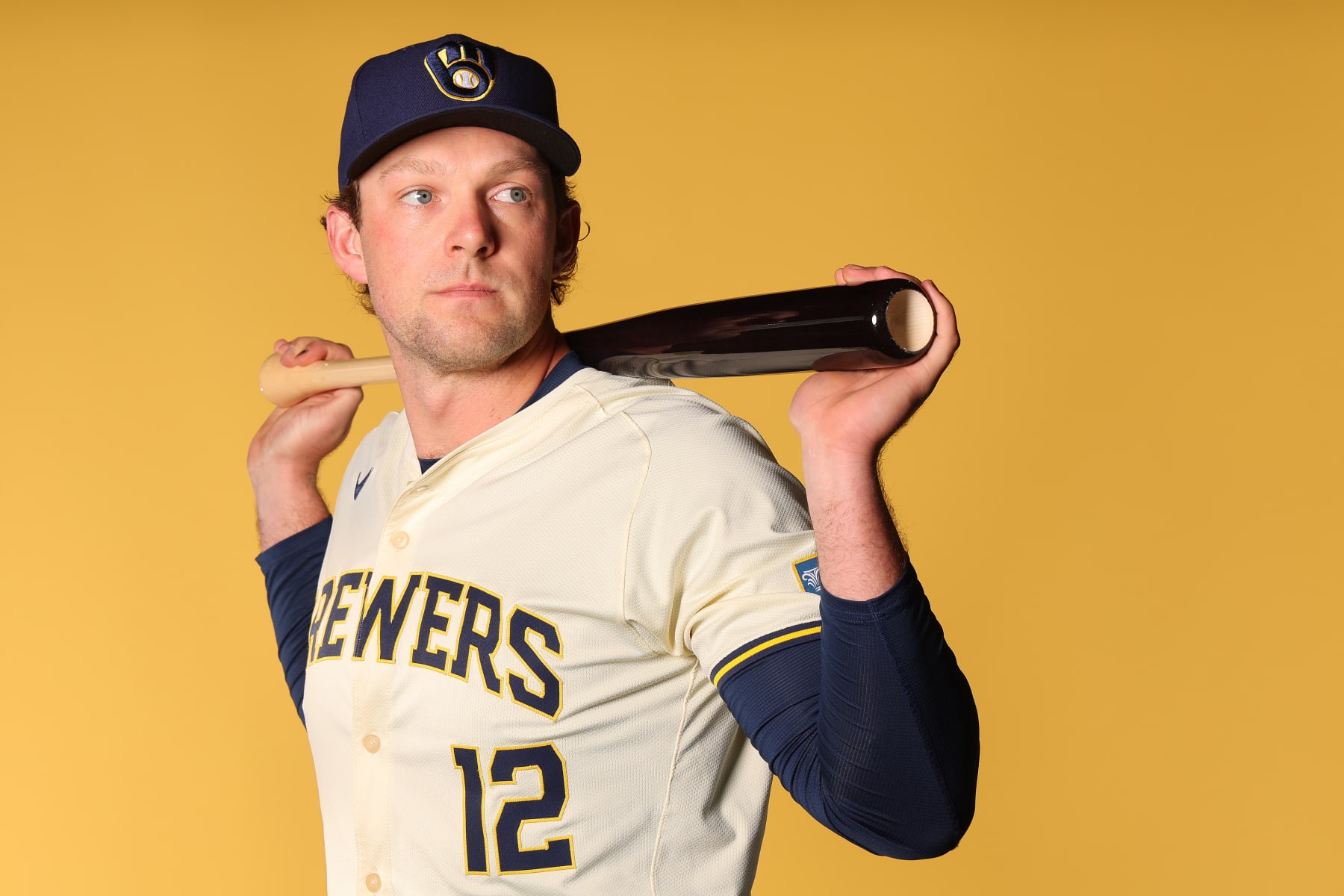 PHOENIX, ARIZONA - FEBRUARY 22: Rhys Hoskins #12 of the Milwaukee Brewers poses for a portrait during Photo Day at American Family Fields of Phoenix on February 22, 2024 in Phoenix, Arizona. (Photo by Michael Reaves/Getty Images)