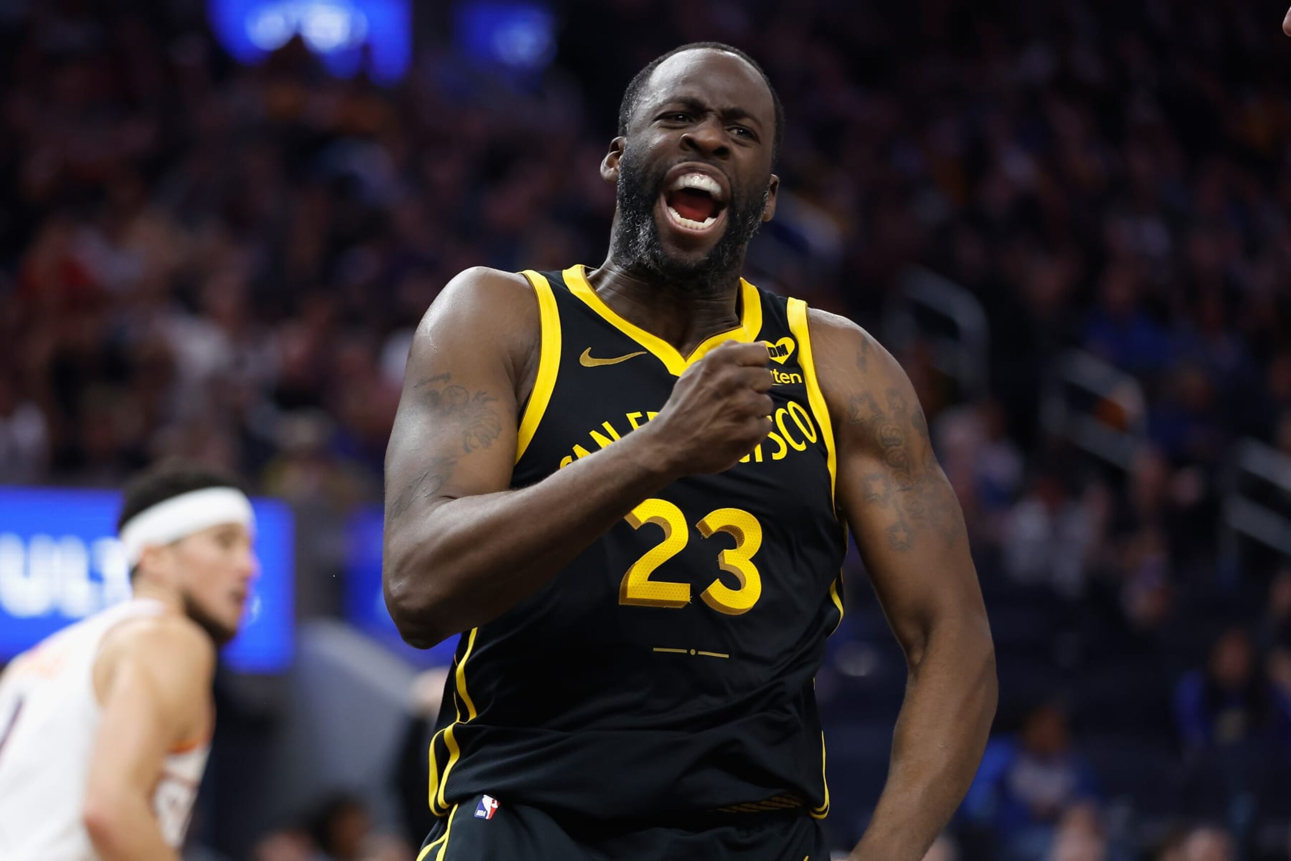 SAN FRANCISCO, CALIFORNIA - FEBRUARY 10: Draymond Green #23 of the Golden State Warriors reacts after a play in the third quarter against the Phoenix Suns at Chase Center on February 10, 2024 in San Francisco, California. NOTE TO USER: User expressly acknowledges and agrees that, by downloading and or using this photograph, User is consenting to the terms and conditions of the Getty Images License Agreement. (Photo by Lachlan Cunningham/Getty Images)