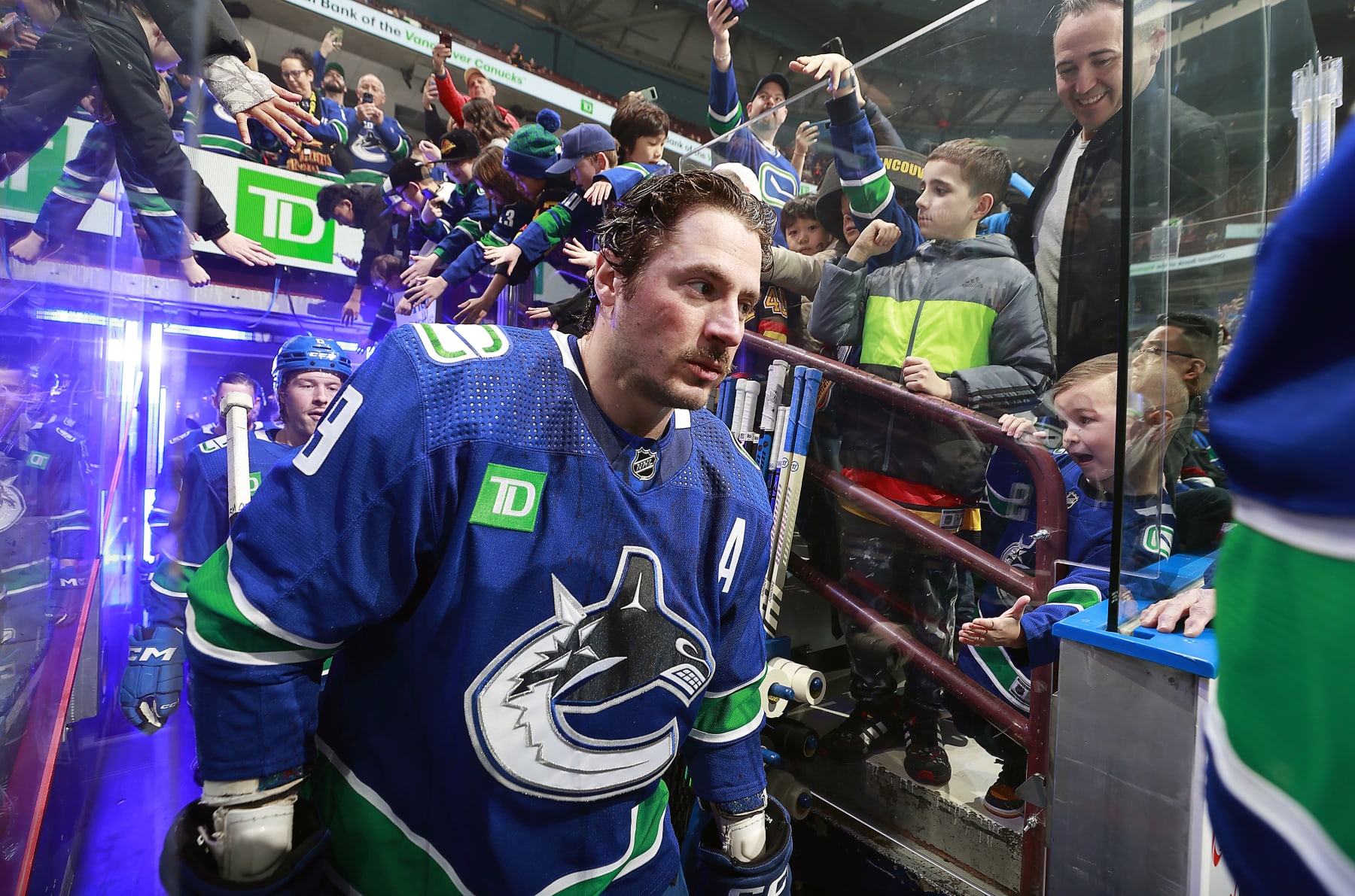 VANCOUVER, CANADA - FEBRUARY 17: J.T. Miller #9 of the Vancouver Canucks walks out to the ice during their NHL game against the Winnipeg Jets at Rogers Arena on February 17, 2024 in Vancouver, British Columbia, Canada.  (Photo by Jeff Vinnick/NHLI via Getty Images)