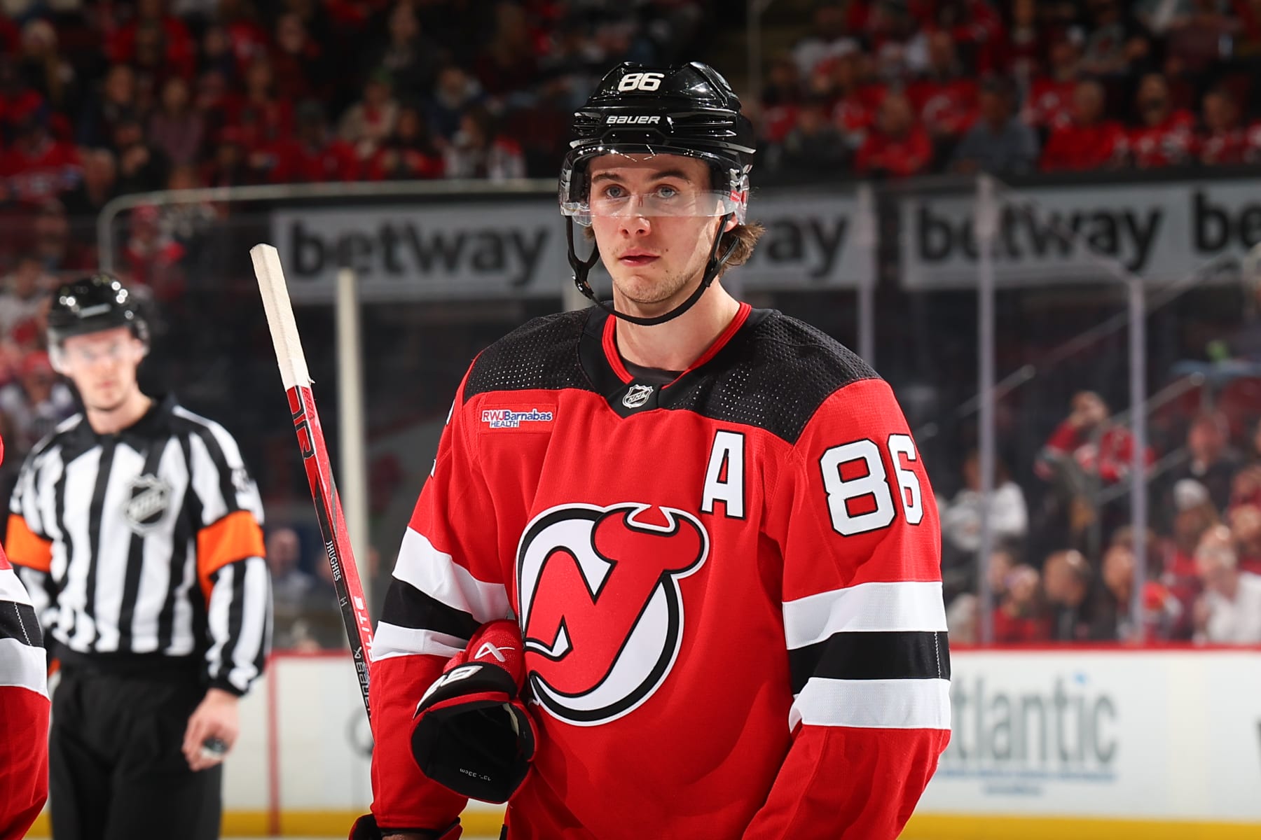 NEWARK, NJ - FEBRUARY 24: Jack Hughes #86 of the New Jersey Devils skates in the first period of the game against the Montreal Canadiens at the Prudential Center on February 24, 2024 in Newark, New Jersey.  (Photo by Rich Graessle/NHLI via Getty Images)