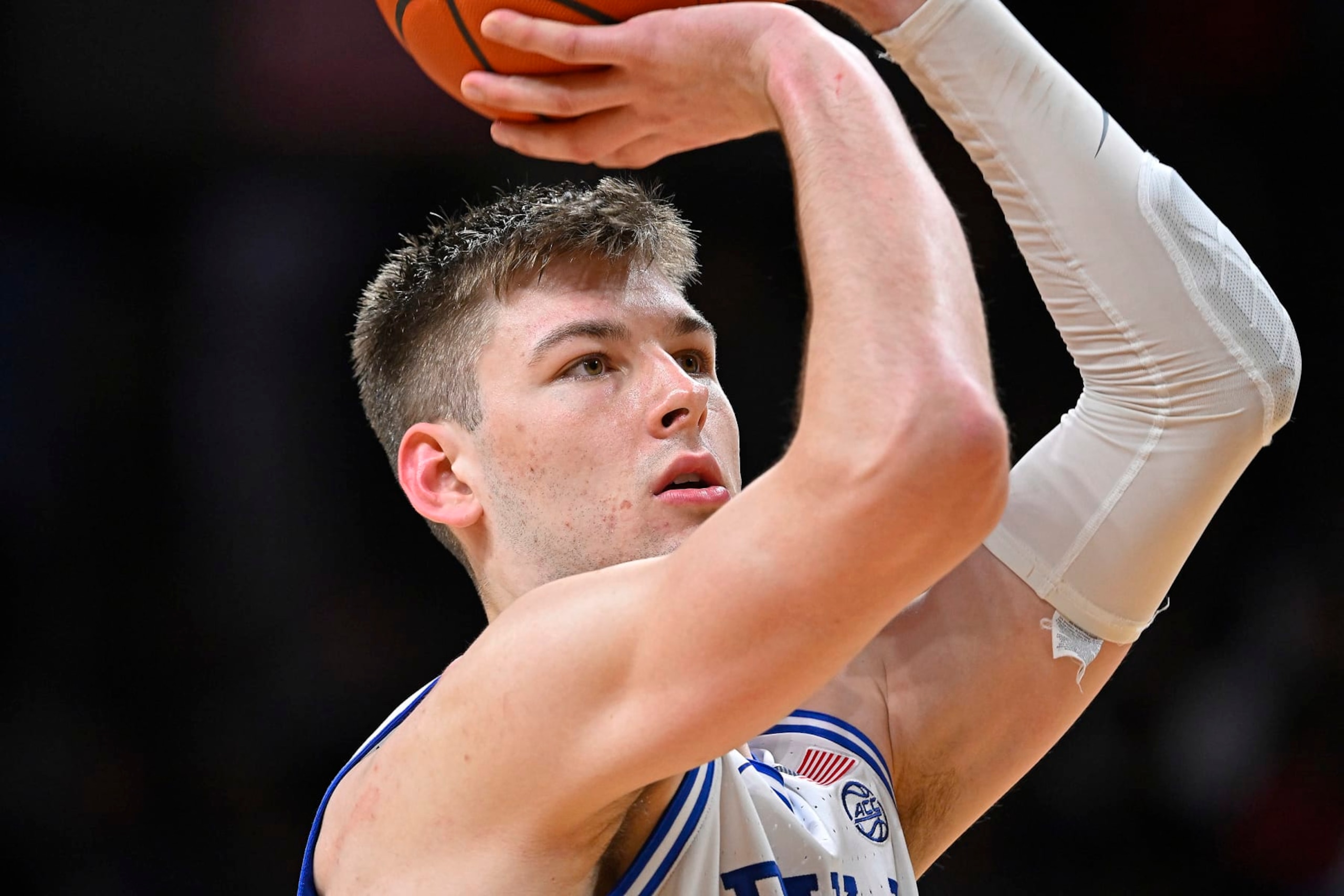CORAL GABLES, FL - FEBRUARY 21: Duke center Kyle Filipowski (30) shoots a free throw after a technical foul in the second half as the Miami Hurricanes faced the Duke Blue Devils on February 21, 2024, at the Watsco Center in Coral Gables, Florida. (Photo by Samuel Lewis/Icon Sportswire via Getty Images)