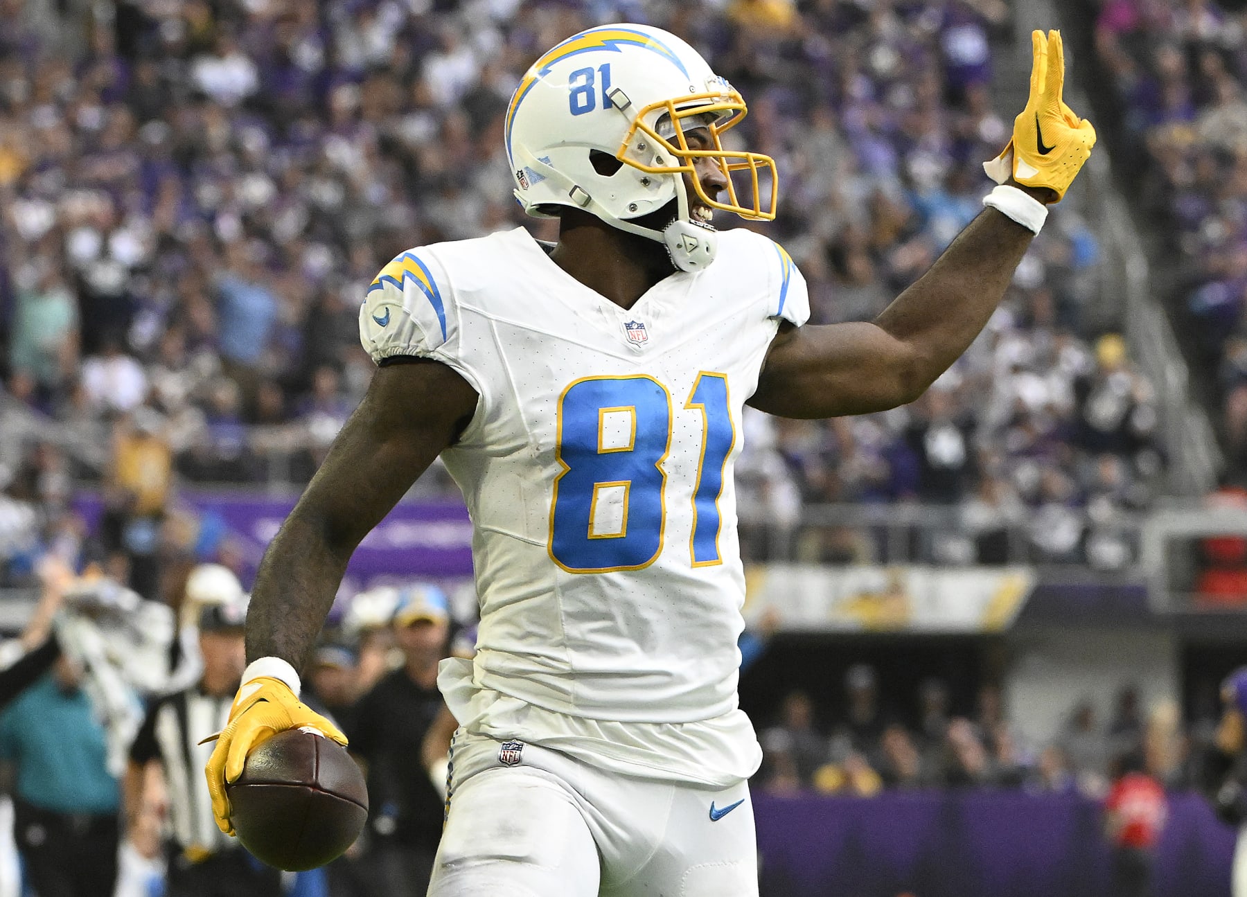 MINNEAPOLIS, MINNESOTA - SEPTEMBER 24: Mike Williams #81 of the Los Angeles Chargers celebrates while scoring a touchdown during the third quarter against the Minnesota Vikings at U.S. Bank Stadium on September 24, 2023 in Minneapolis, Minnesota. (Photo by Stephen Maturen/Getty Images)