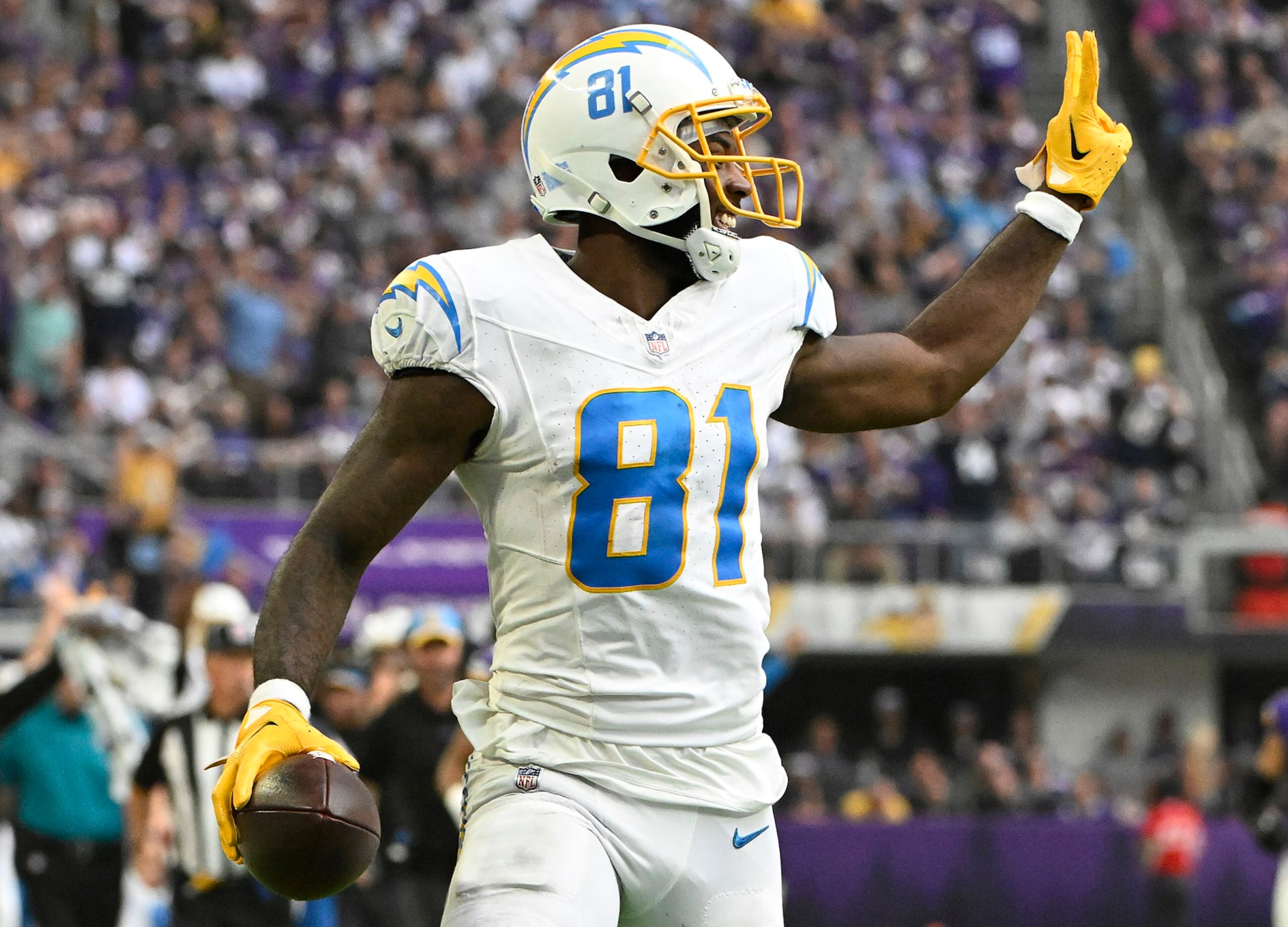 MINNEAPOLIS, MINNESOTA - SEPTEMBER 24: Mike Williams #81 of the Los Angeles Chargers celebrates while scoring a touchdown during the third quarter against the Minnesota Vikings at U.S. Bank Stadium on September 24, 2023 in Minneapolis, Minnesota. (Photo by Stephen Maturen/Getty Images)