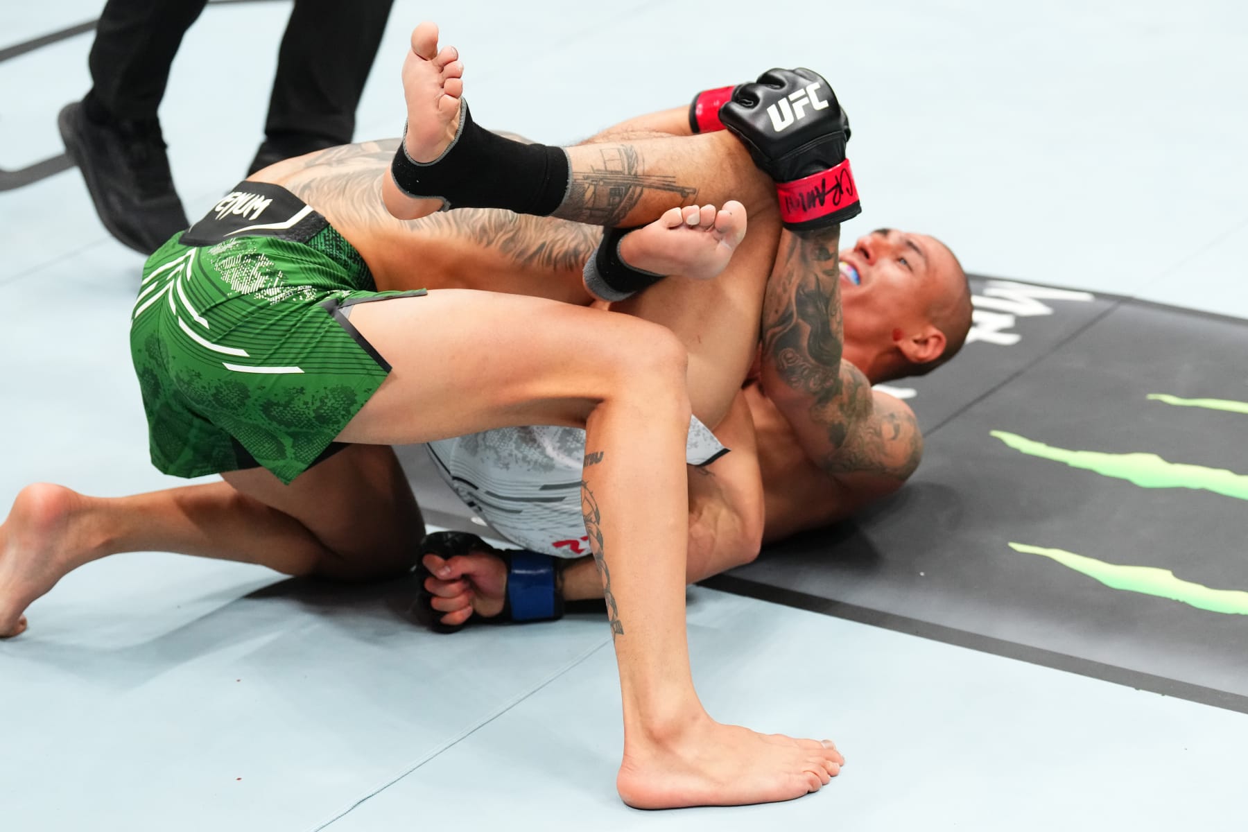MEXICO CITY, MEXICO - FEBRUARY 24: (R-L) Edgar Chairez of Mexico attempts to submit Daniel Lacerda of Brazil in a flyweight fight during the UFC Fight Night event at Arena CDMX on February 24, 2024 in Mexico City, Mexico. (Photo by Josh Hedges/Zuffa LLC via Getty Images)